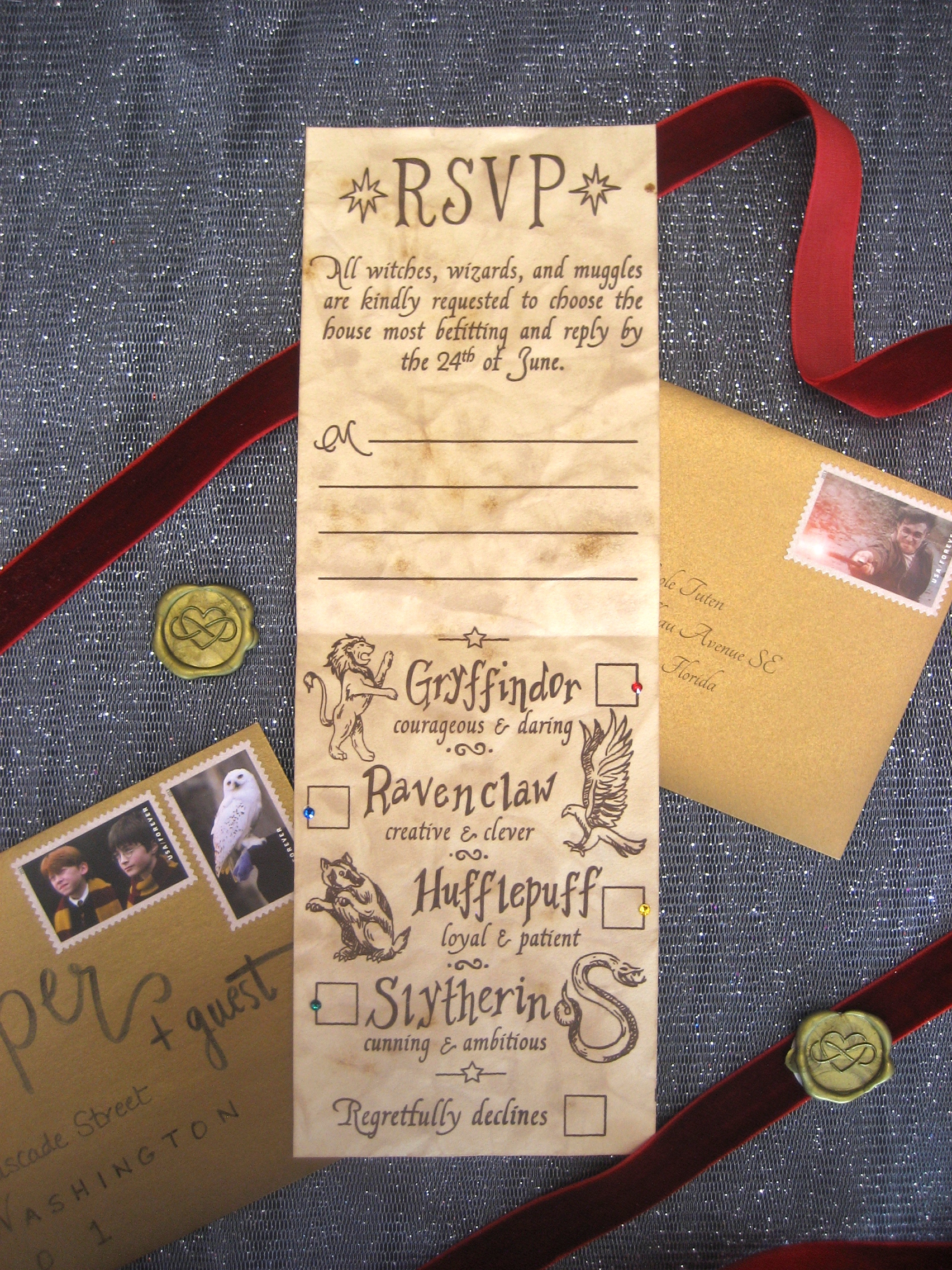 Choose a house! Gryffindor? Ravenclaw? Hufflepuff? Or Slytherin?! RSVP cards for a Harry Potter themed wedding.