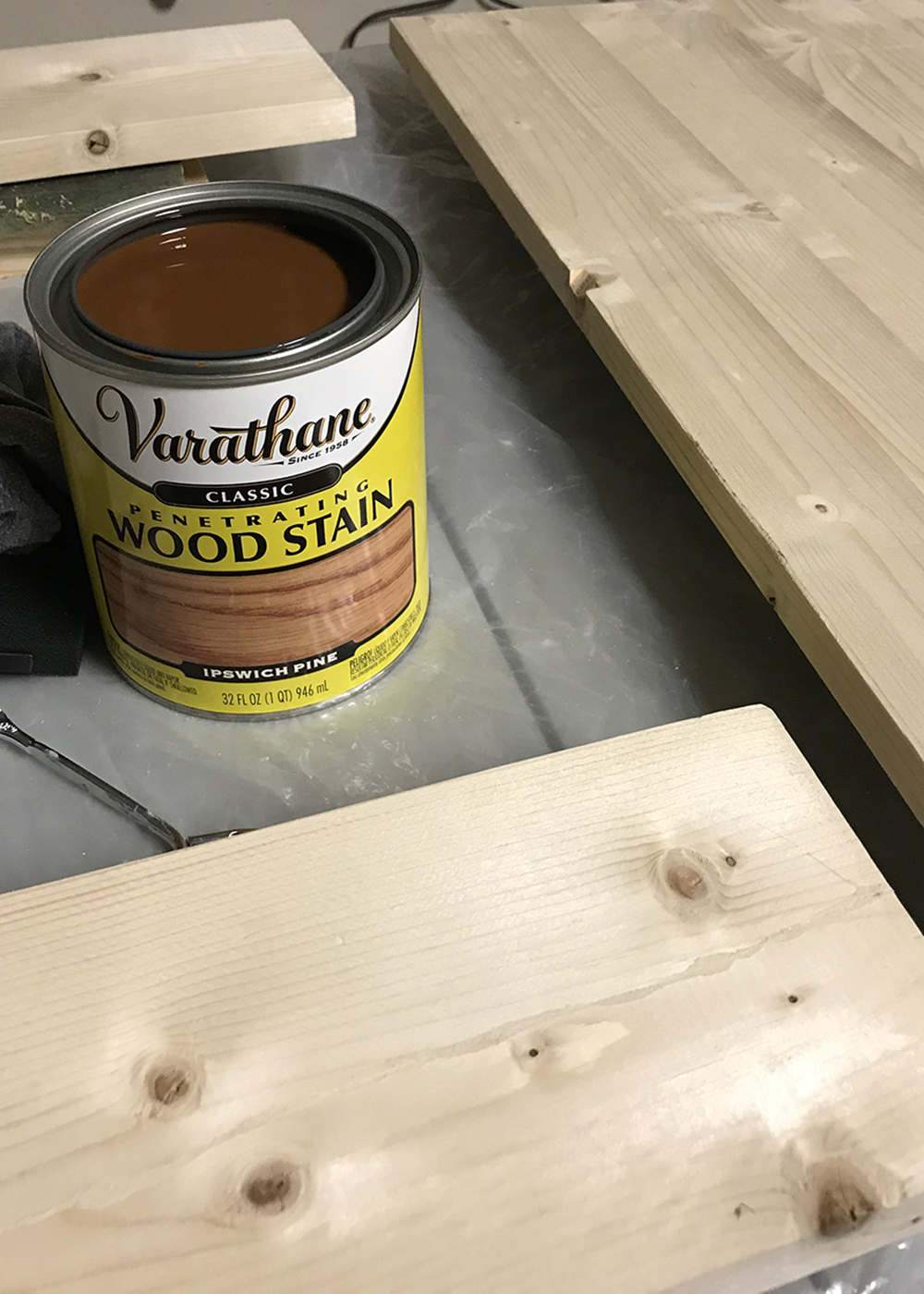 Staining the wood shelves