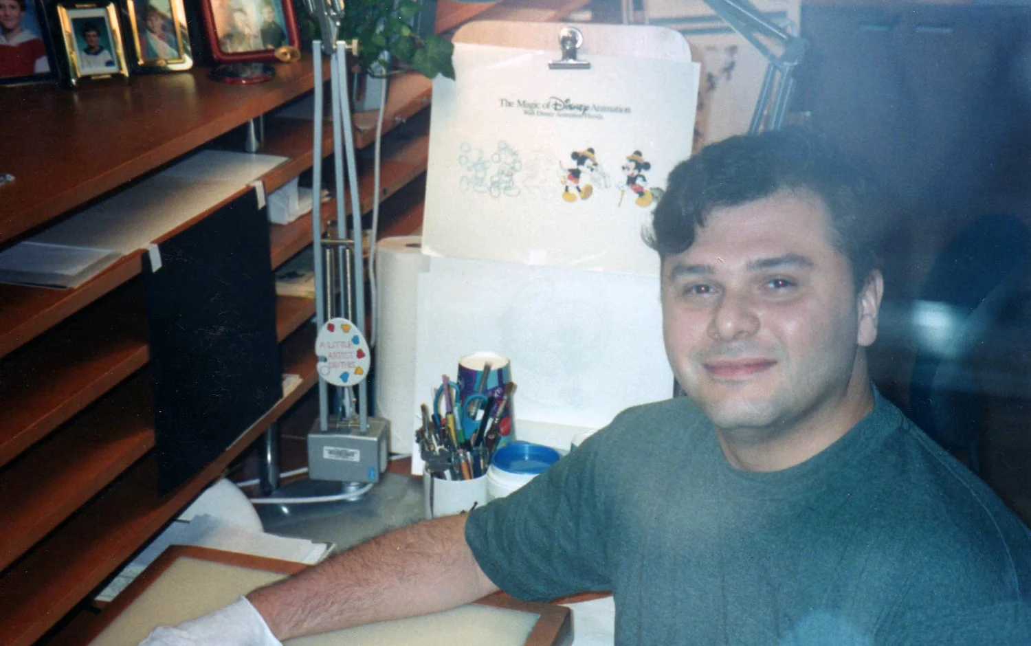 A view of the Ink and Paint studio desks from the audience side of the animation tour back in early 1997. Getting used to wearing gloves to paint cels was quite necessary to keep the cels from fingerprints, scratches and dings.