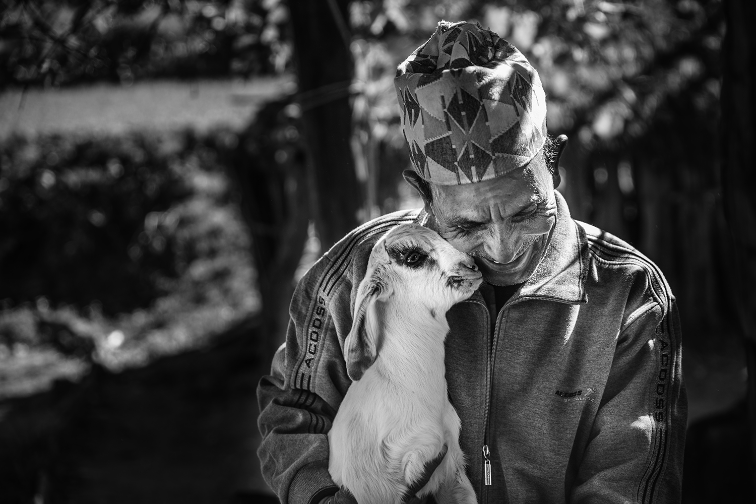Dilip and his goat. His family keeps several goats around the premises. 