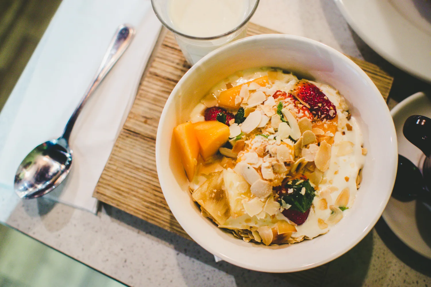 Bar 9 House Muesli: sheeps' milk honeyed yogurt, seasonal fruit & vanilla dressing - $10.00