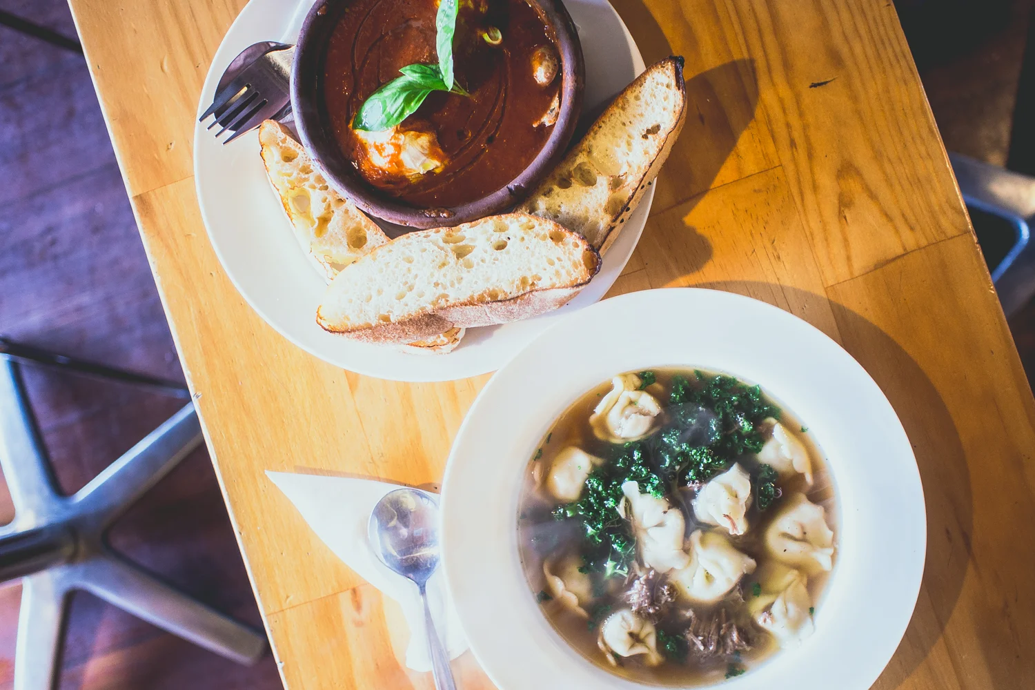 Baked Eggs - Sugo Salsicce with Italian pork and fennel sausage - $15 and Brodino: Beef consome with shredded beef, kale and tortellini - $15