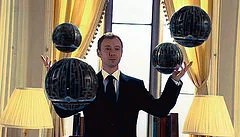 He's wearing a suit and he can juggle...how evil could he be?