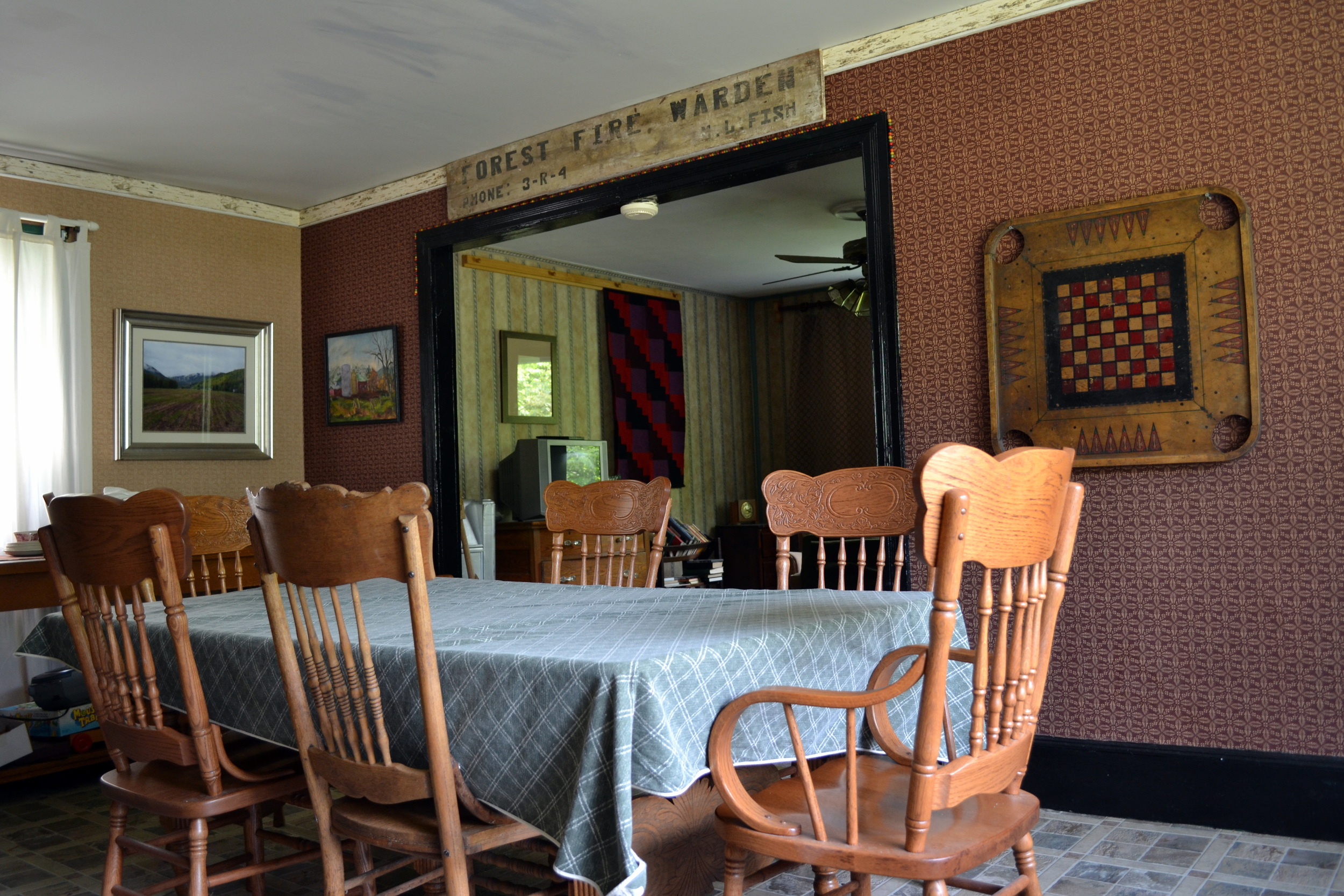  The antique dining room table has seen many holiday dinners. 