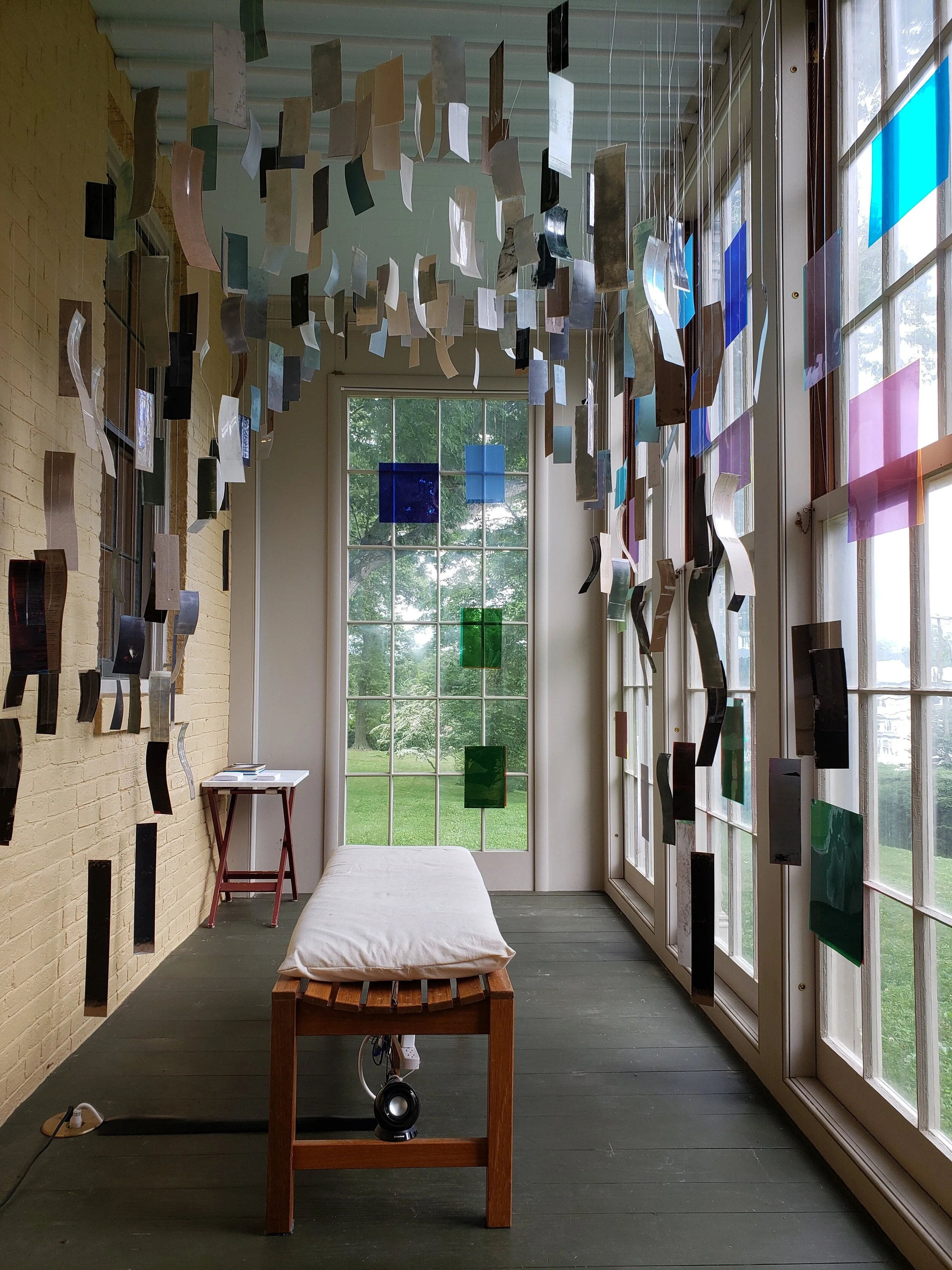  A site-specific art installation at the Emily Dickinson Museum featuring work by Tereza Swanda, Ingrid Pichler, and Fletcher Boot, aims to forge the colors Dickinson saw from the conservatory out into her landscape. In this meditation on suspension,
