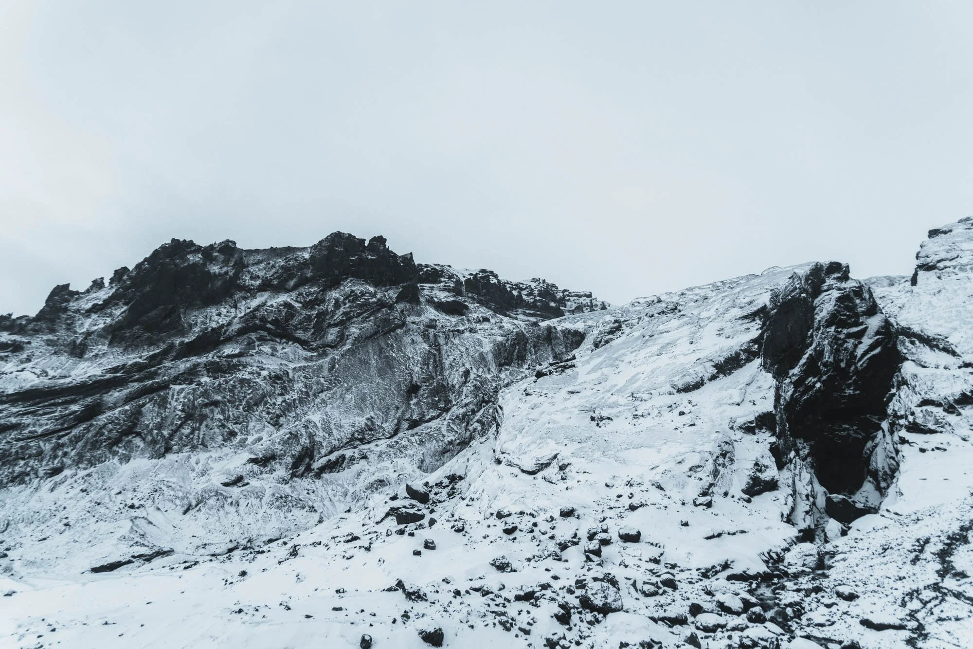 Snowy Volcanic Ridge With Dark Rock - SIG07813.jpg