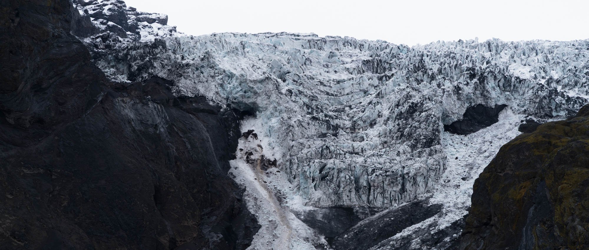 Gígjökull Glacier Between Dark Cliffs.jpg
