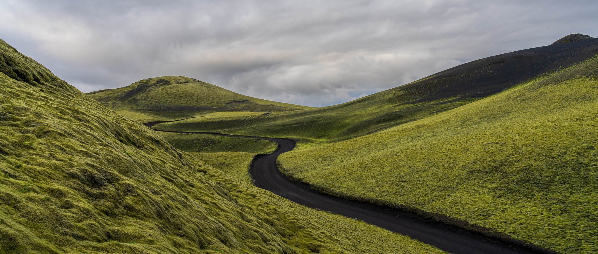 Lakagígar Road Between Green Volcanic Slopes.jpg
