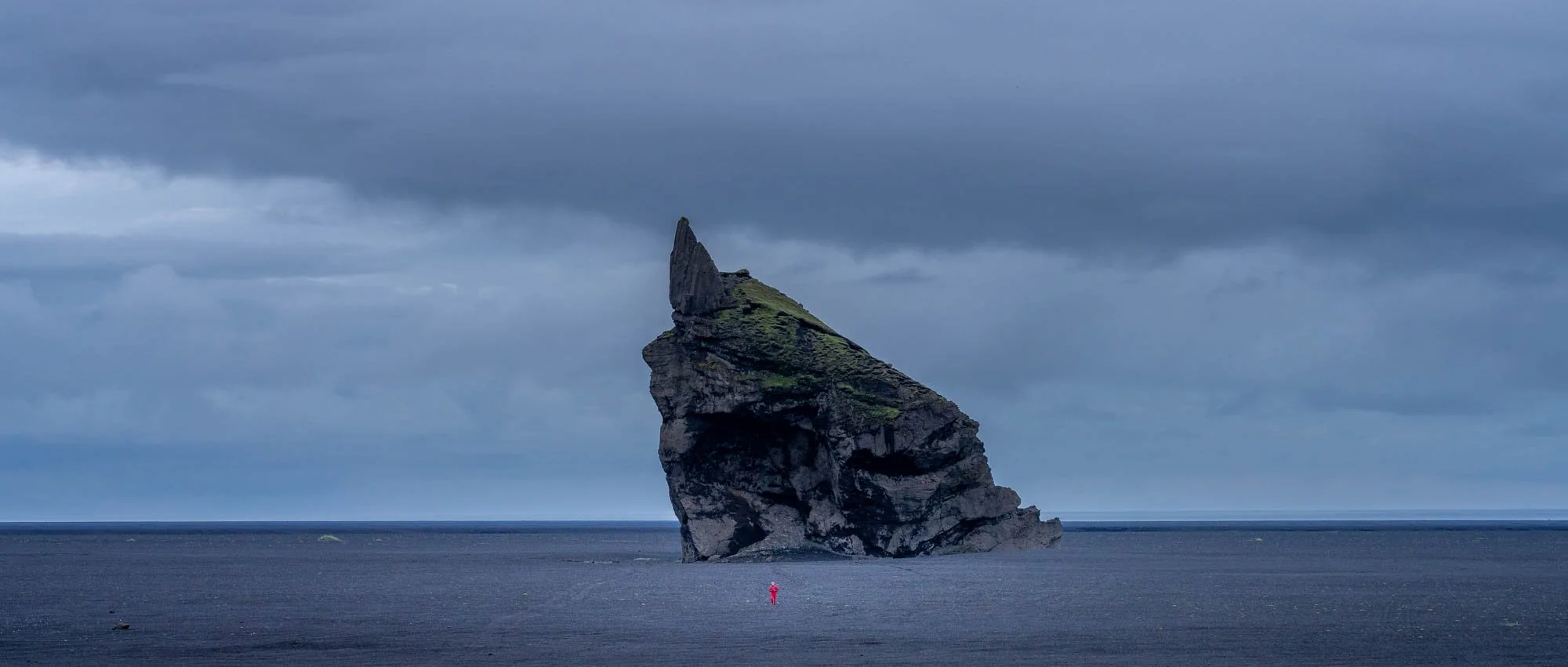 Lásadrangur Sea Stack at Hjörleifshöfði.jpg