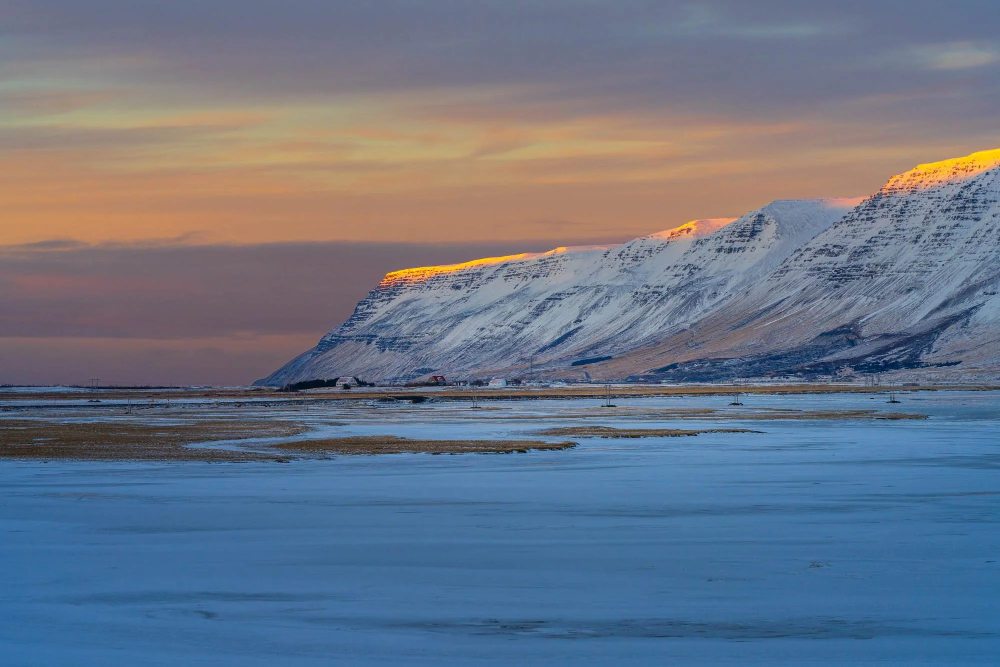 Golden Edge on a Snowy Fjord Mountain.jpg