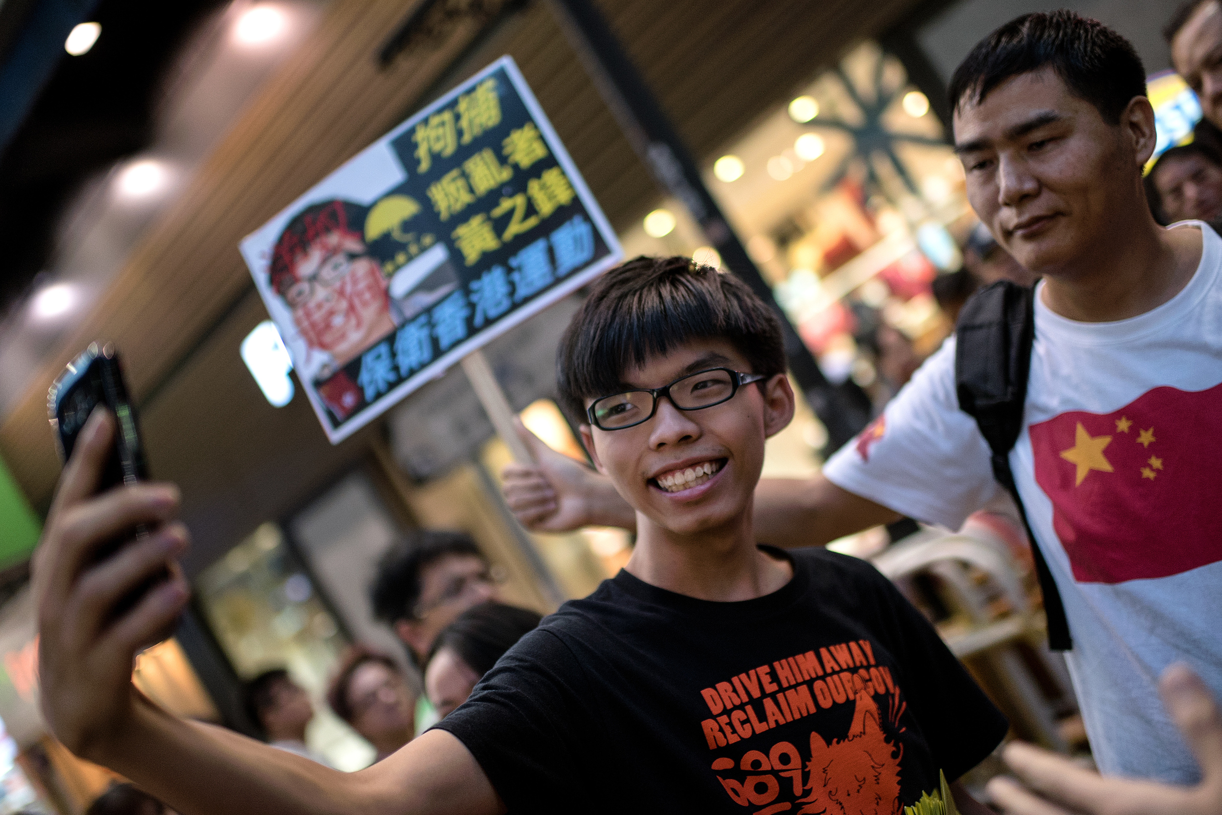 Joshua Wong and pro-China protester