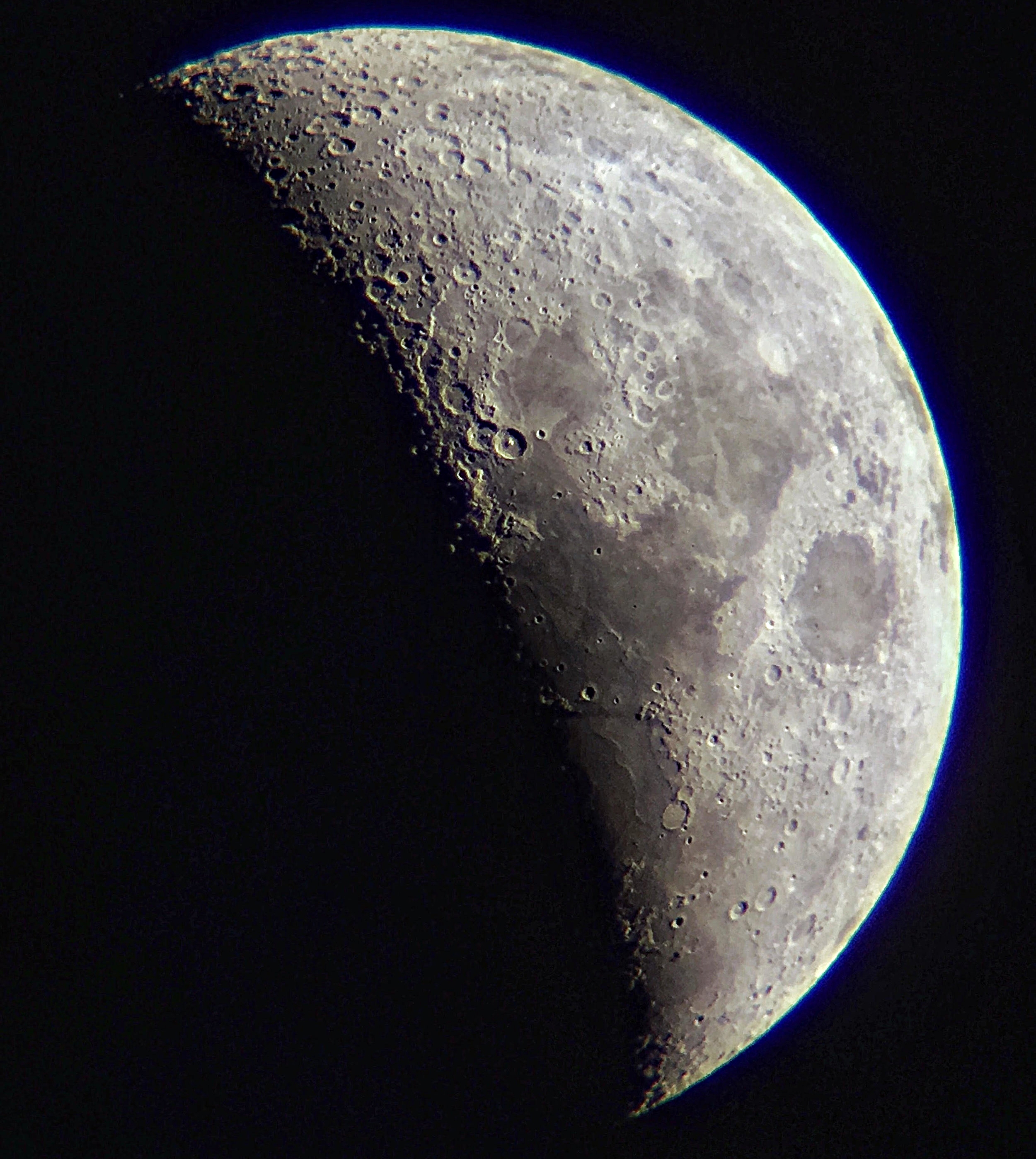 Moon through telescope lens