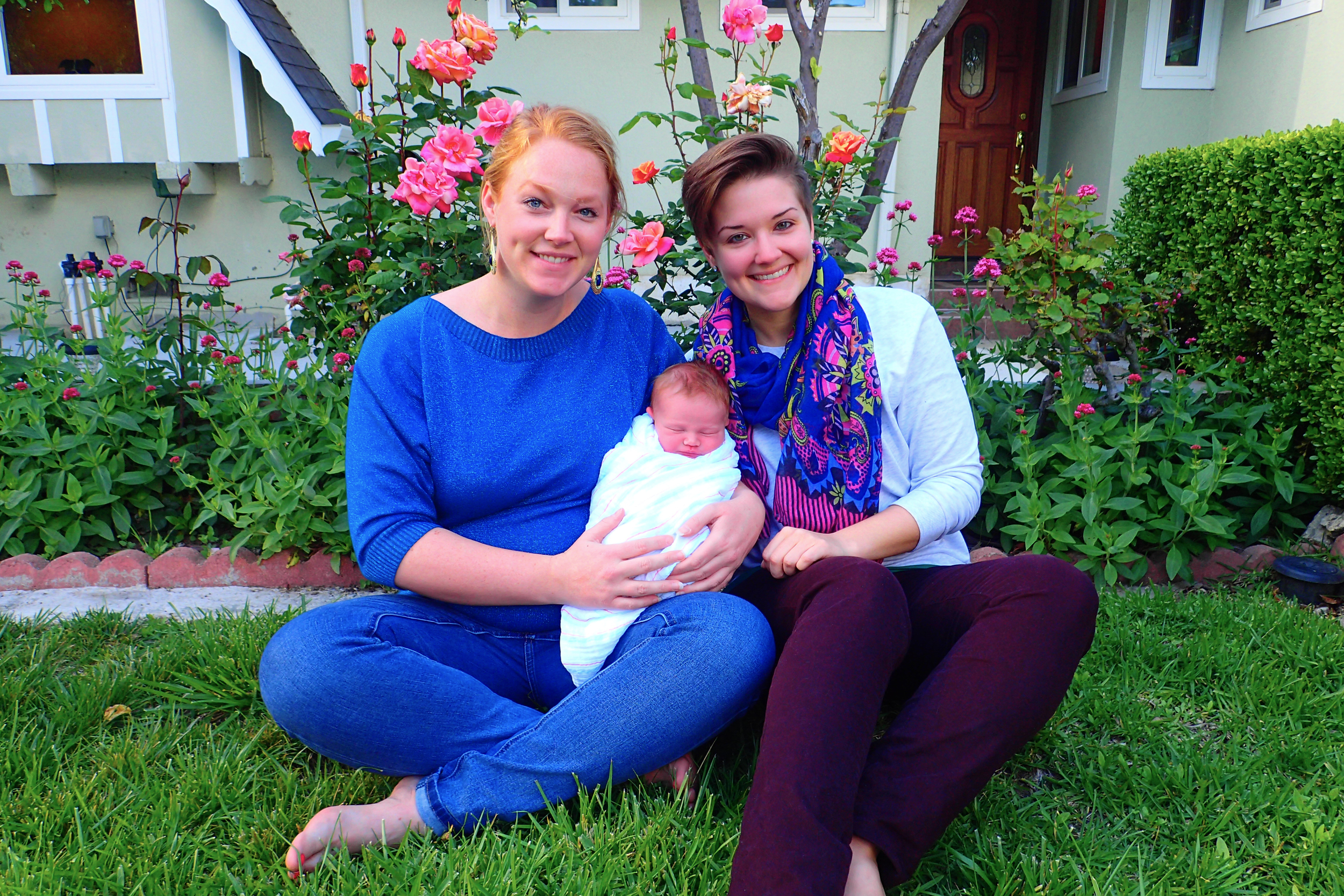 Erin, me, and baby Logan in front of their home in California