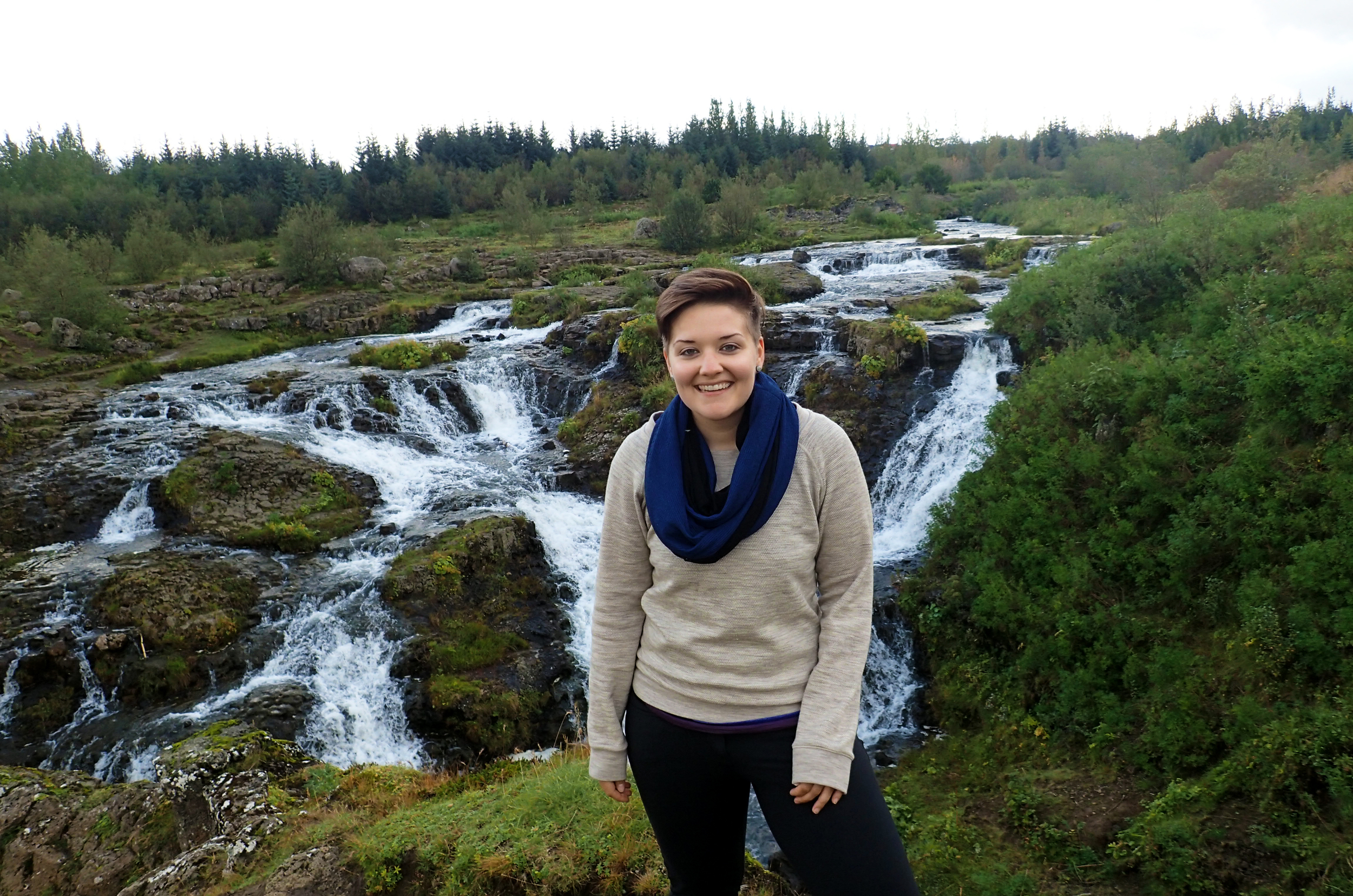 I am a one day old traveler here, standing in front of a small waterfall in Breiðholt, Iceland