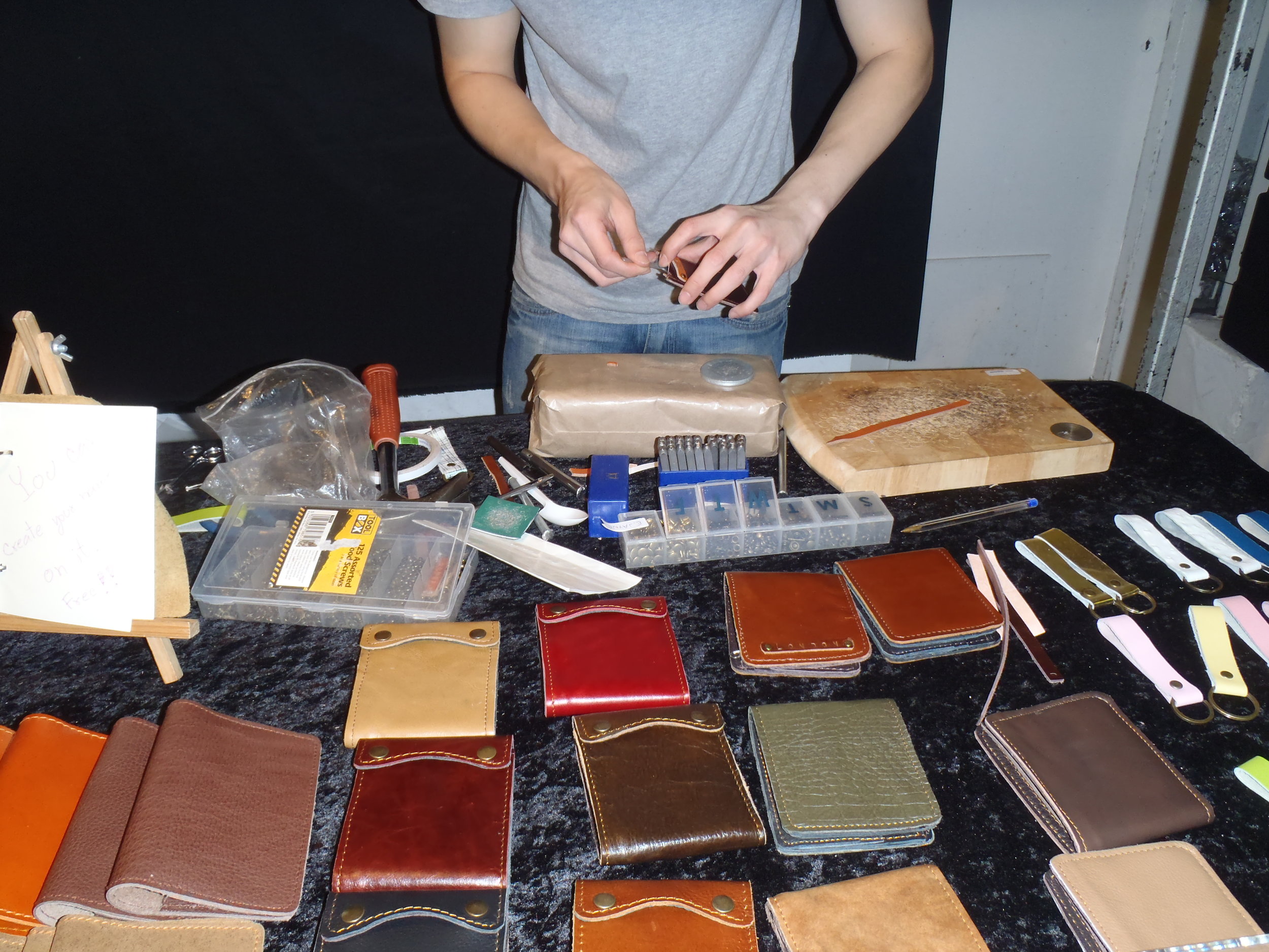 Getting my wallet custom made at the Brick Lane Markets in London back in 2012