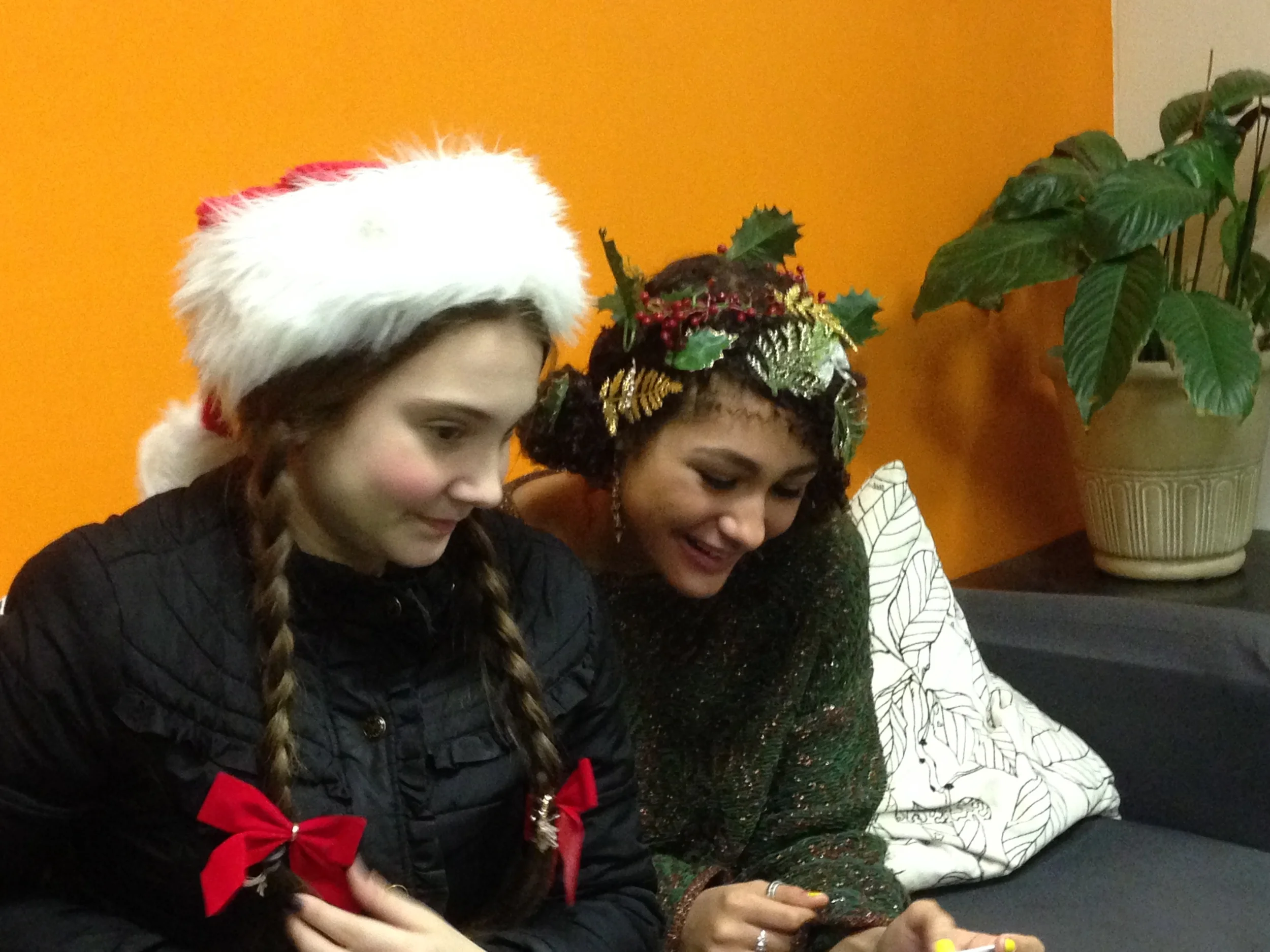 High school students dress as "Santa's Elves" and escort our young visitors for pictures with Santa.