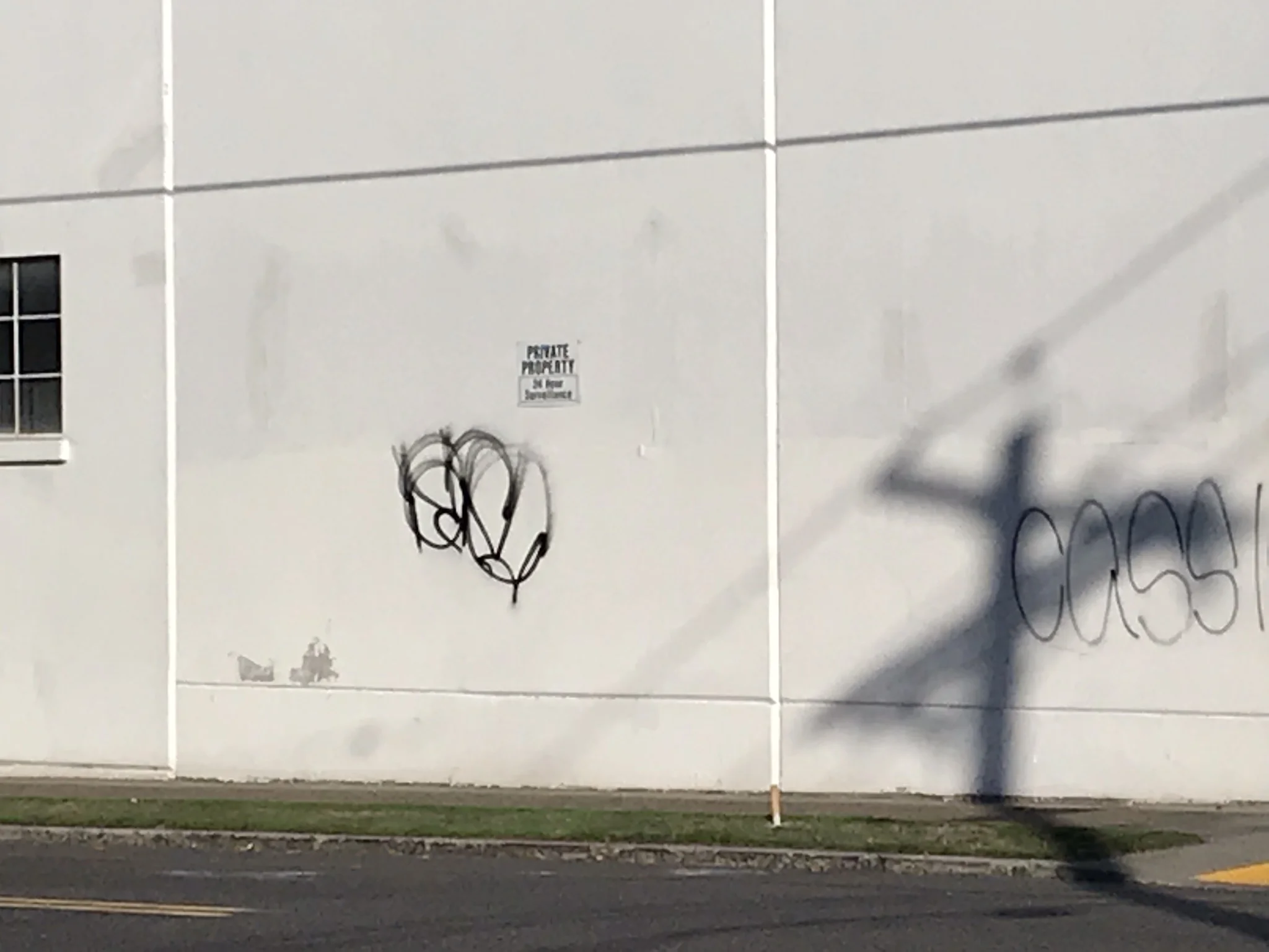 Photograph (digital) of building across the street from Mudshark.