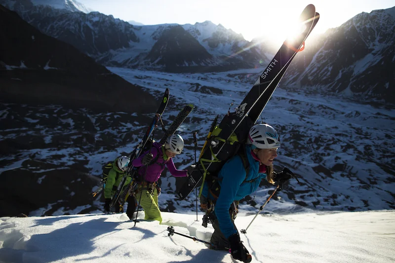 Jessica Baker leads Emillie Drinkwater and Sheldon Kerr up a ridge line overlooking the Barnard Glacier in the Wrangell St Elias Mountains in AK. (C) Krystal Wright