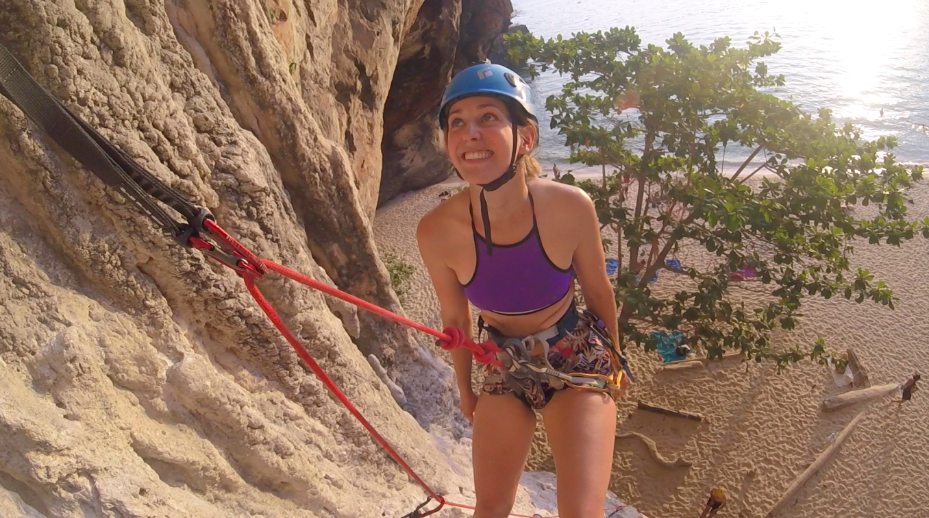 Nicole Rowles rock climbing.png