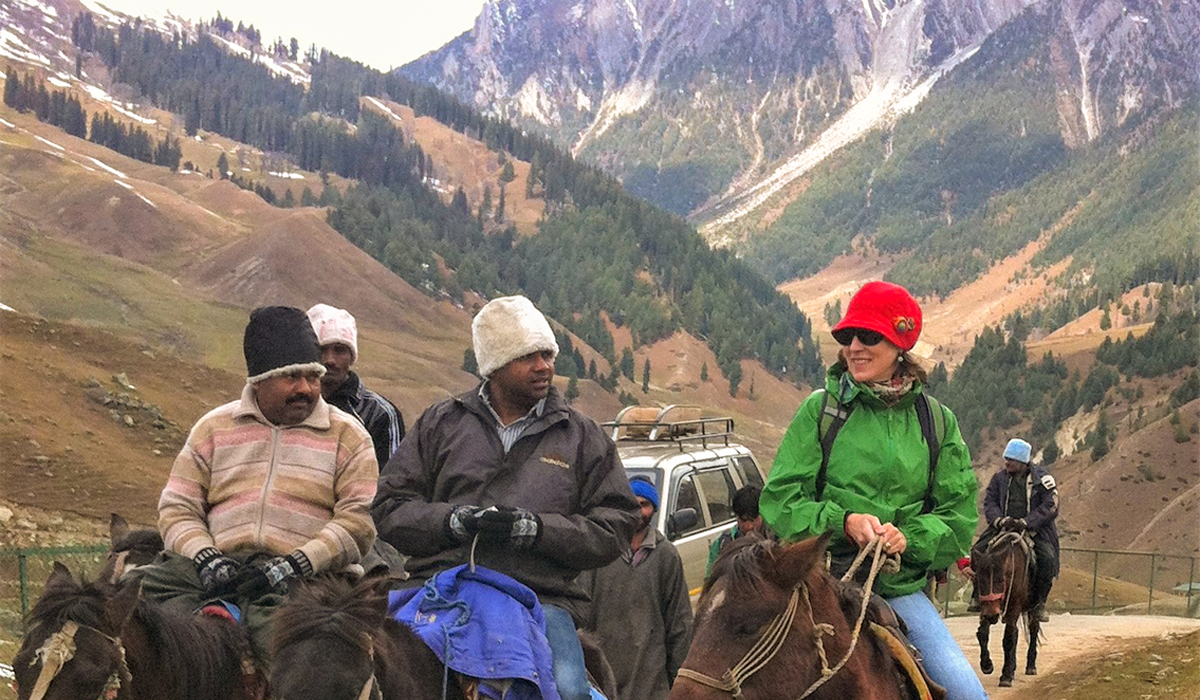Oh horseback in Kashmir. © Catherine Marshall