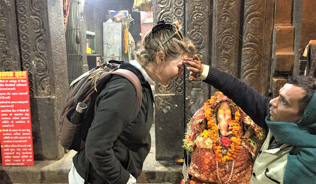 Receiving a blessing from a Brahmin in the Himalayan region of Uttarakhand. © Catherine Marshall
