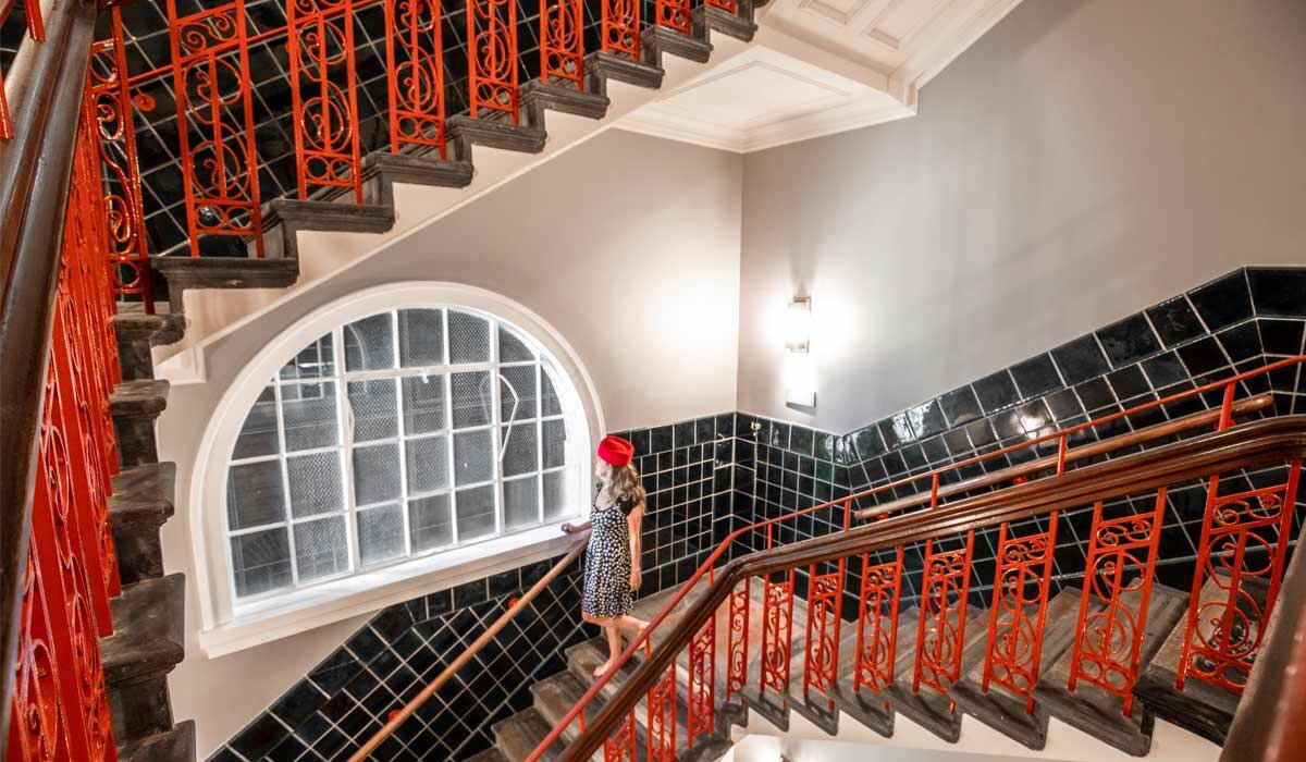 The original stairwell has been beautifully restored. Image Fiona Harper