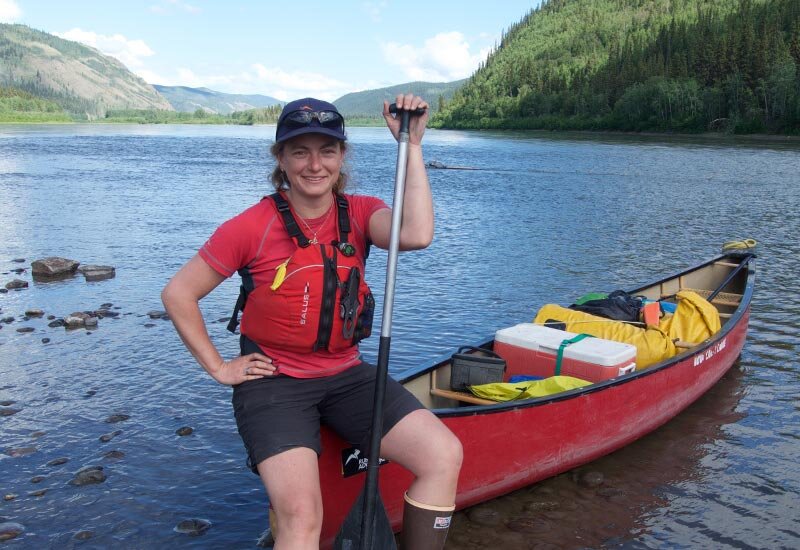 Silke guiding a canoe tour on the Yukon River. Image Ruby Range Adventures