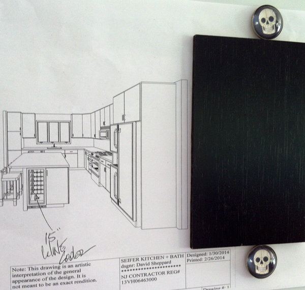 The kitchen turned out just like the drawing from January, but the cabinet swatch does not match the cabinets.