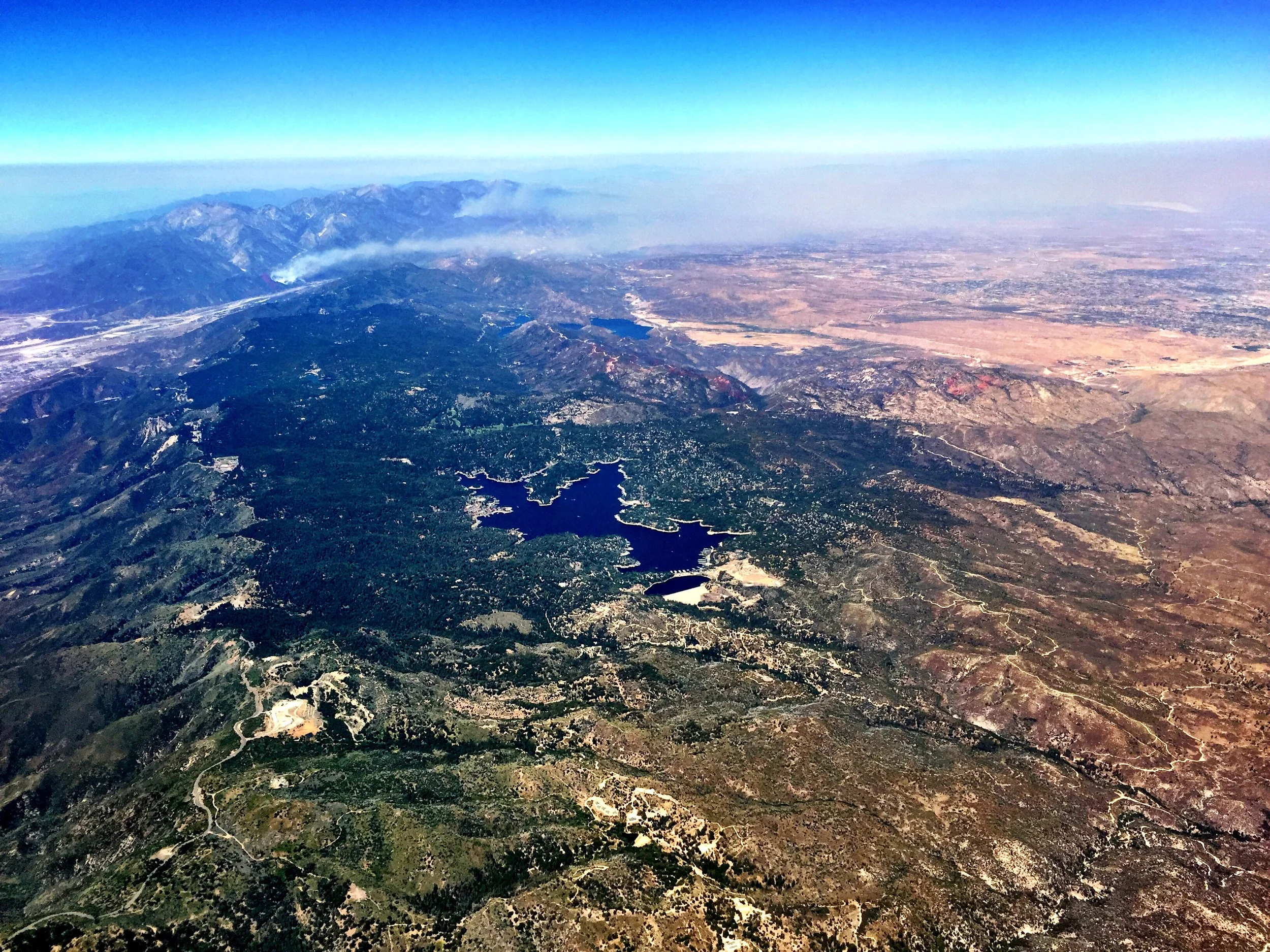 Over Running Springs, California, with a view of wildfires on the mountain, at 1:52 PM.