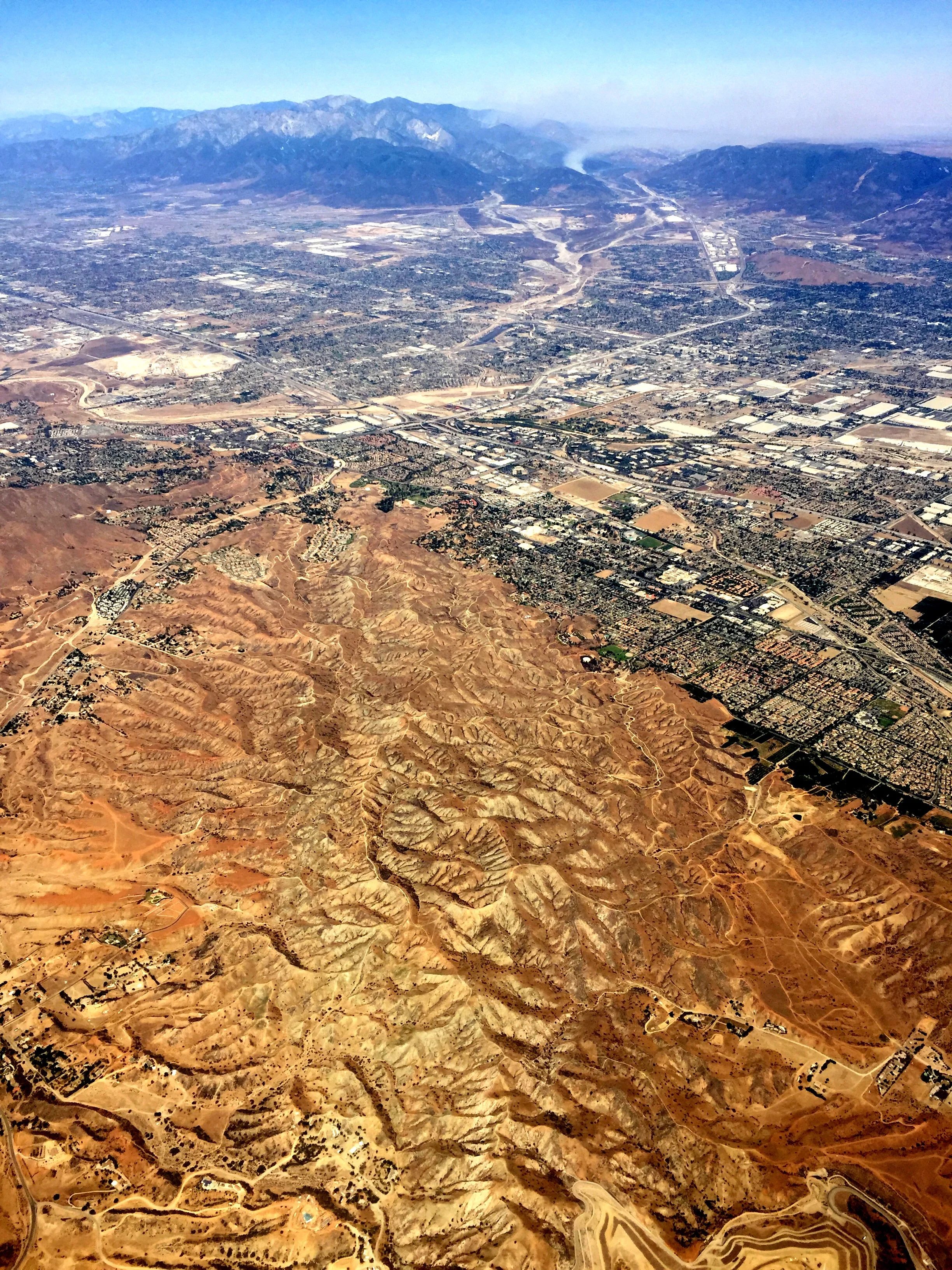 Over Redlands, California, with wildfires on the horizon at 1:56 PM.