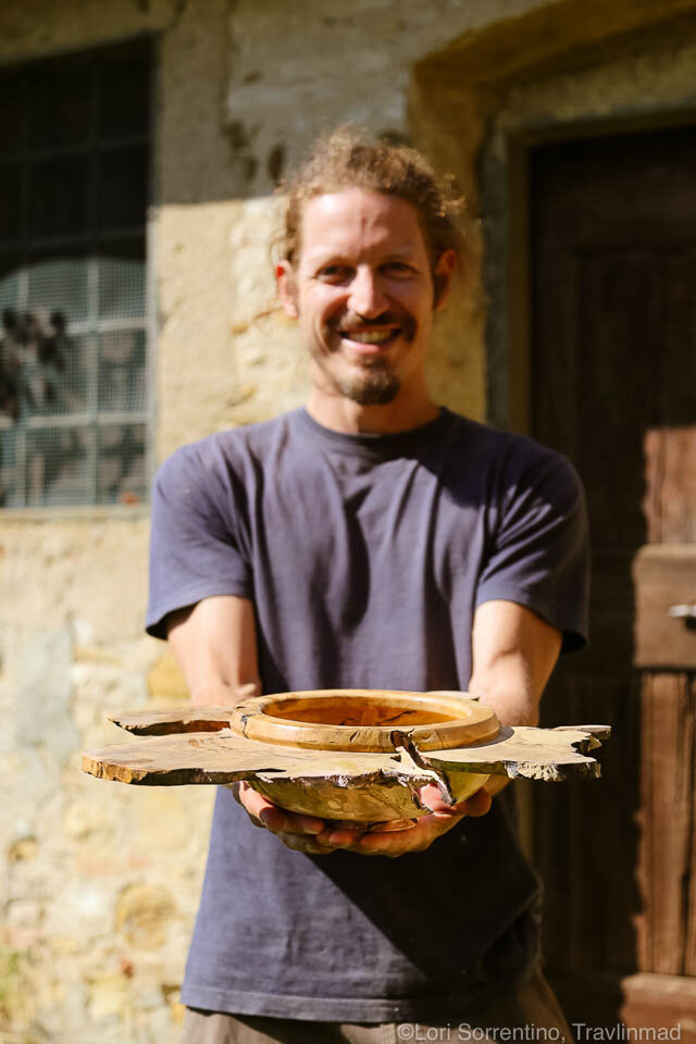 A one-of-a-kind handcrafted olive wood bowl from Tuscany
