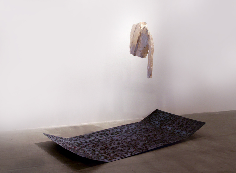  Installation view of “If I'd Known That Beforehand” | 8x4 ft. |&nbsp;Welded metal sheet with Farsi text, Handmade coat   