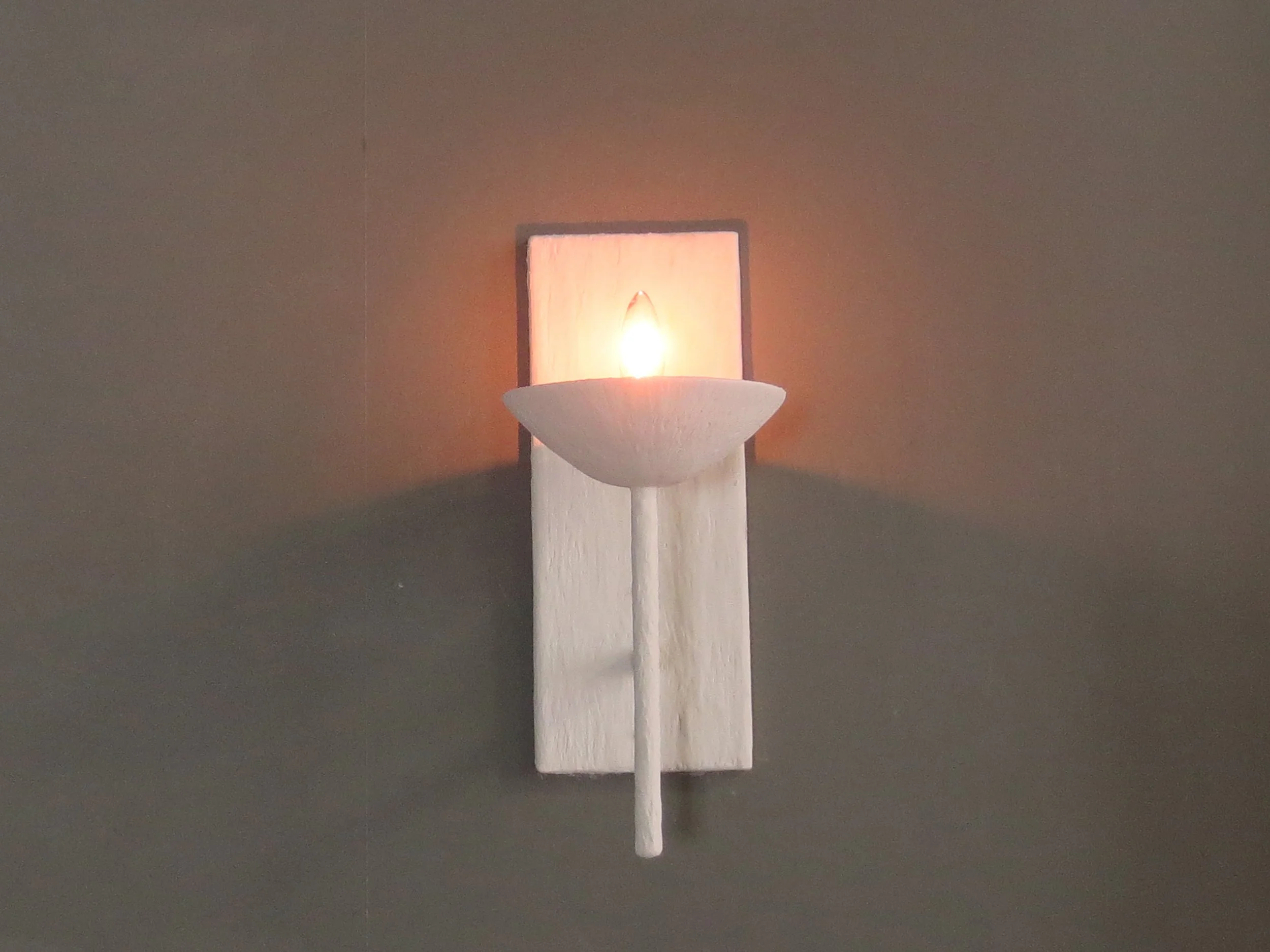 Single Arm Sconce Lit.JPG