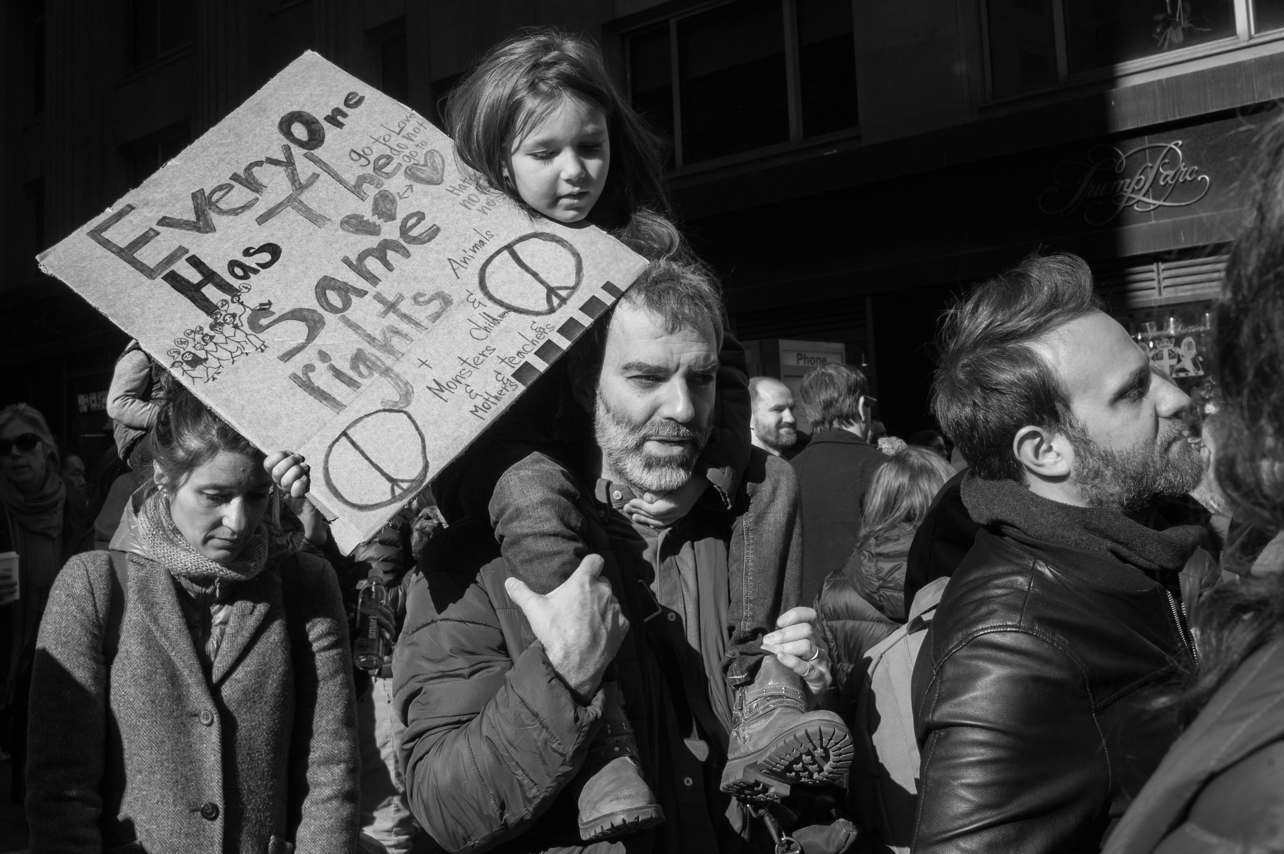 Girl and Father Protesting
