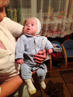 She walked in with a little wide-eyed blue bundle and placed him in my arms.