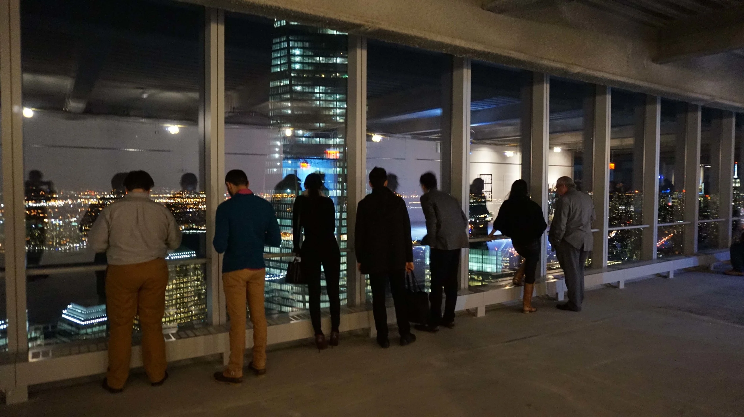 people looking out WTC 4 window.jpg