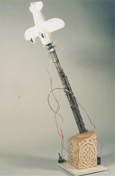 Air Playing, 8"x20"x6", model air plane, flute, wood & motor, 2007