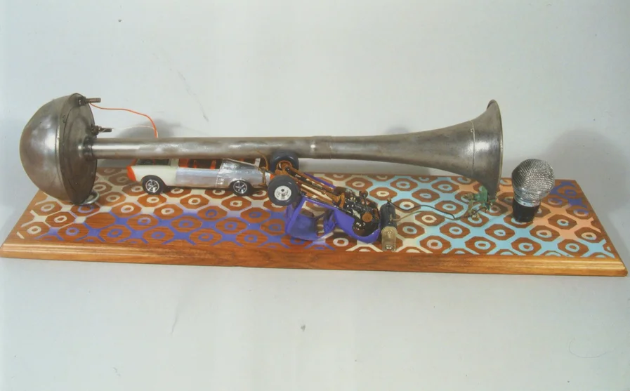 Car-Chestra, 24"x6"x6", truck horn, model cars, microphone head, acrylic & wood, 2007