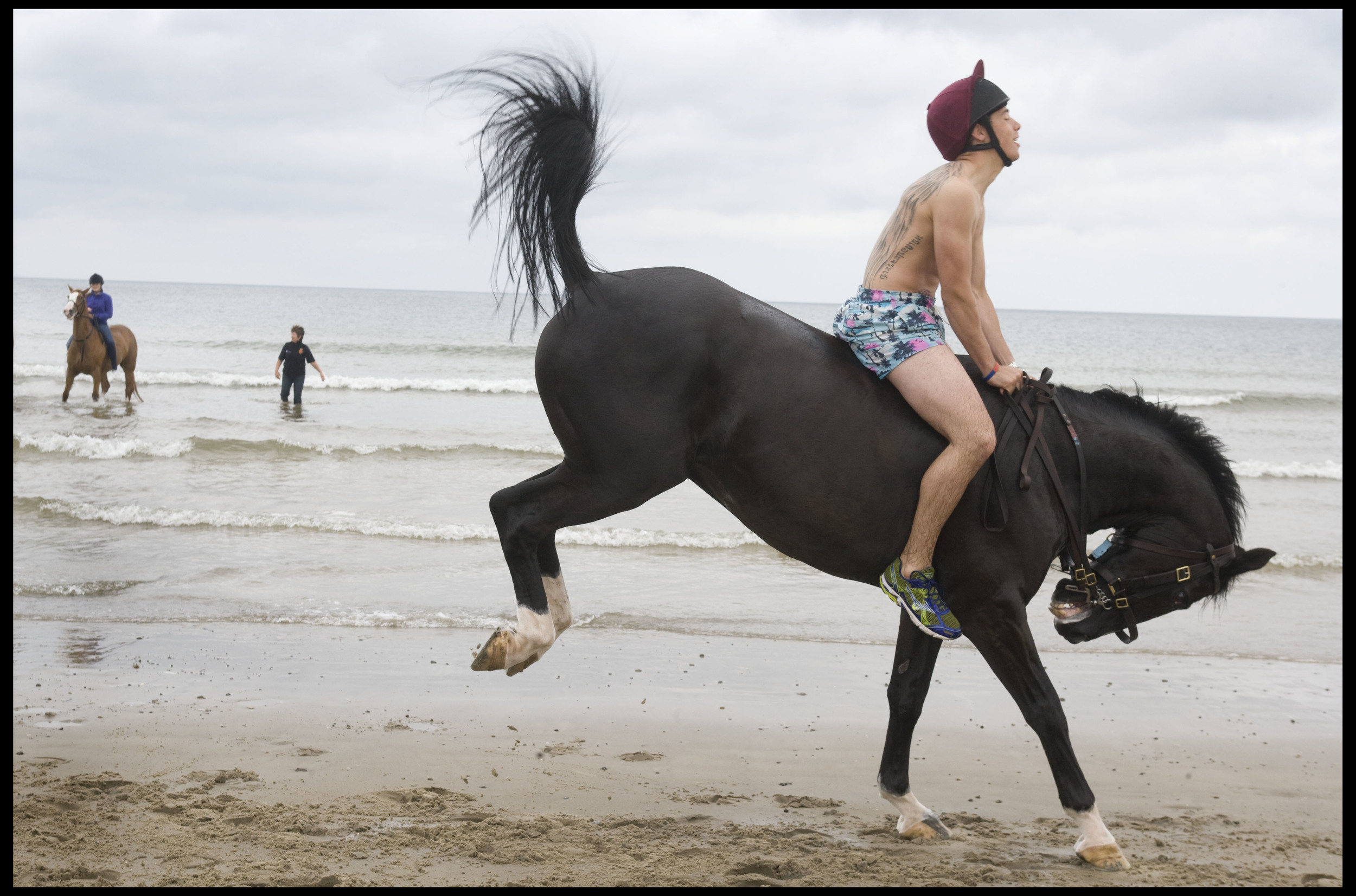 The Household Cavalry enjoy some relaxation on Holkham Beach, Norfolk