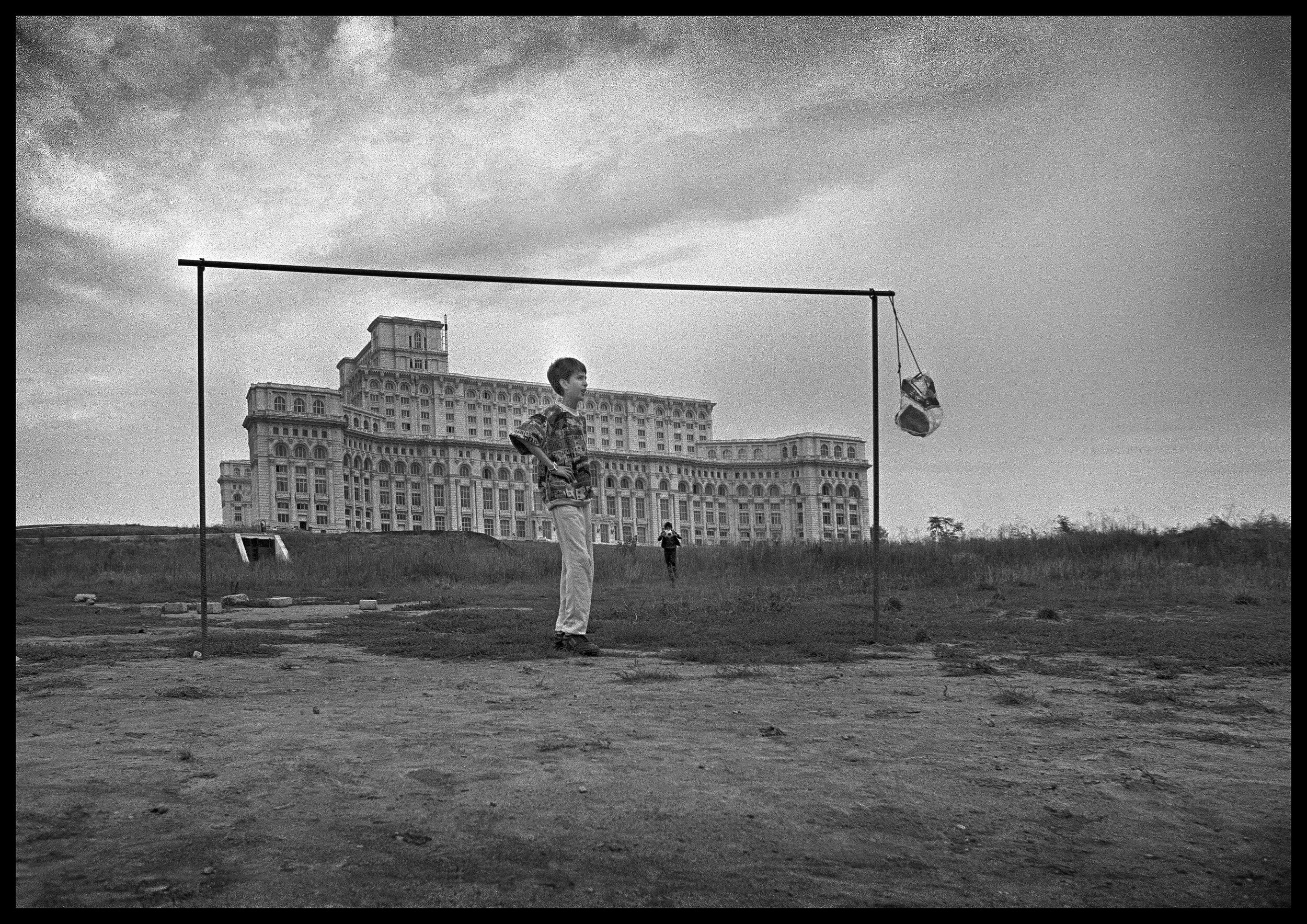 Football on waste ground behind Ceausescu's palace, Bucharest,Romania