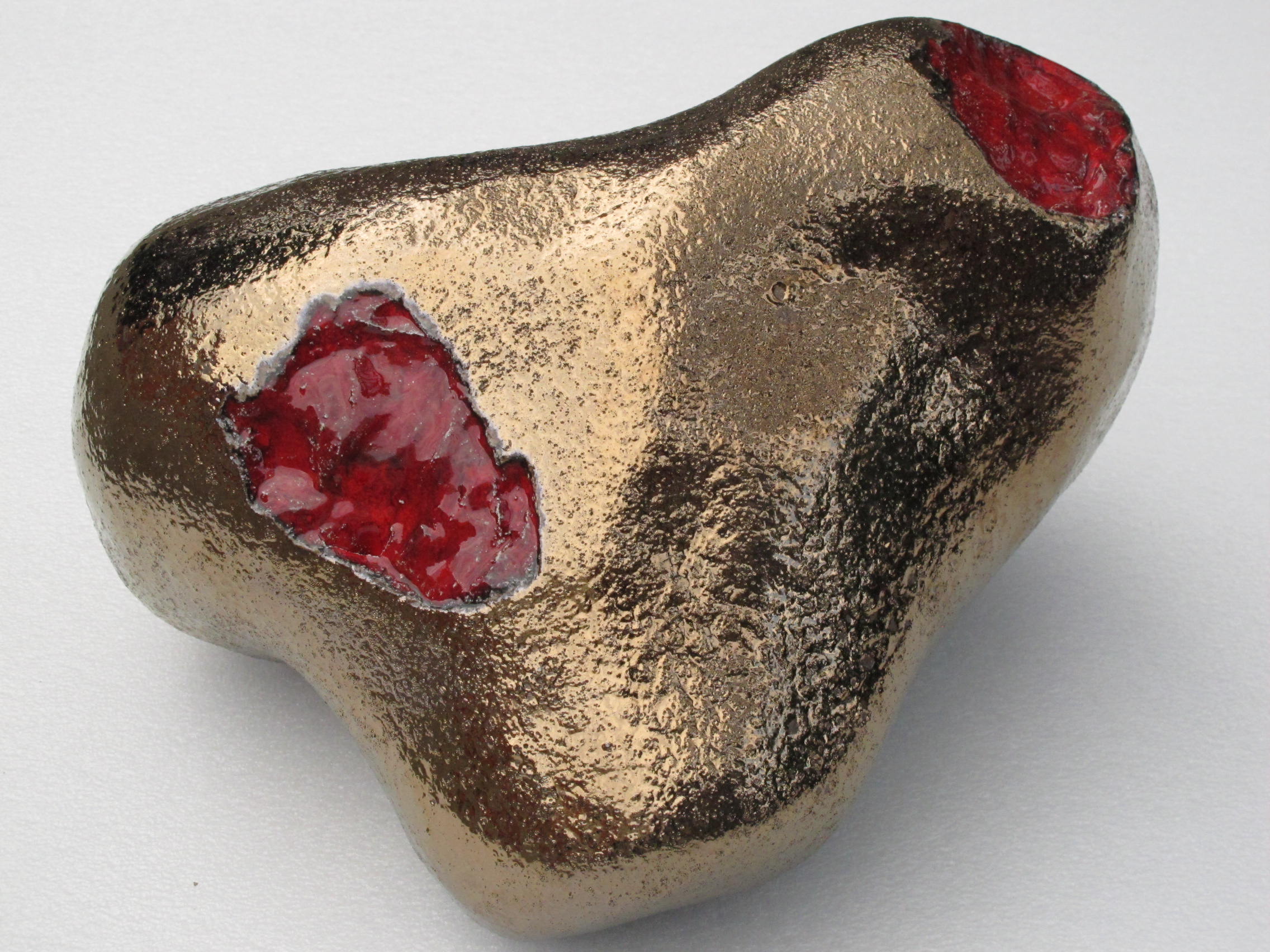  Beloved Mutant, 2013. Stoneware with bronze and gloss red glazes. 20" L x 10" H x 15" W. Made at the European Ceramic Work Centre 