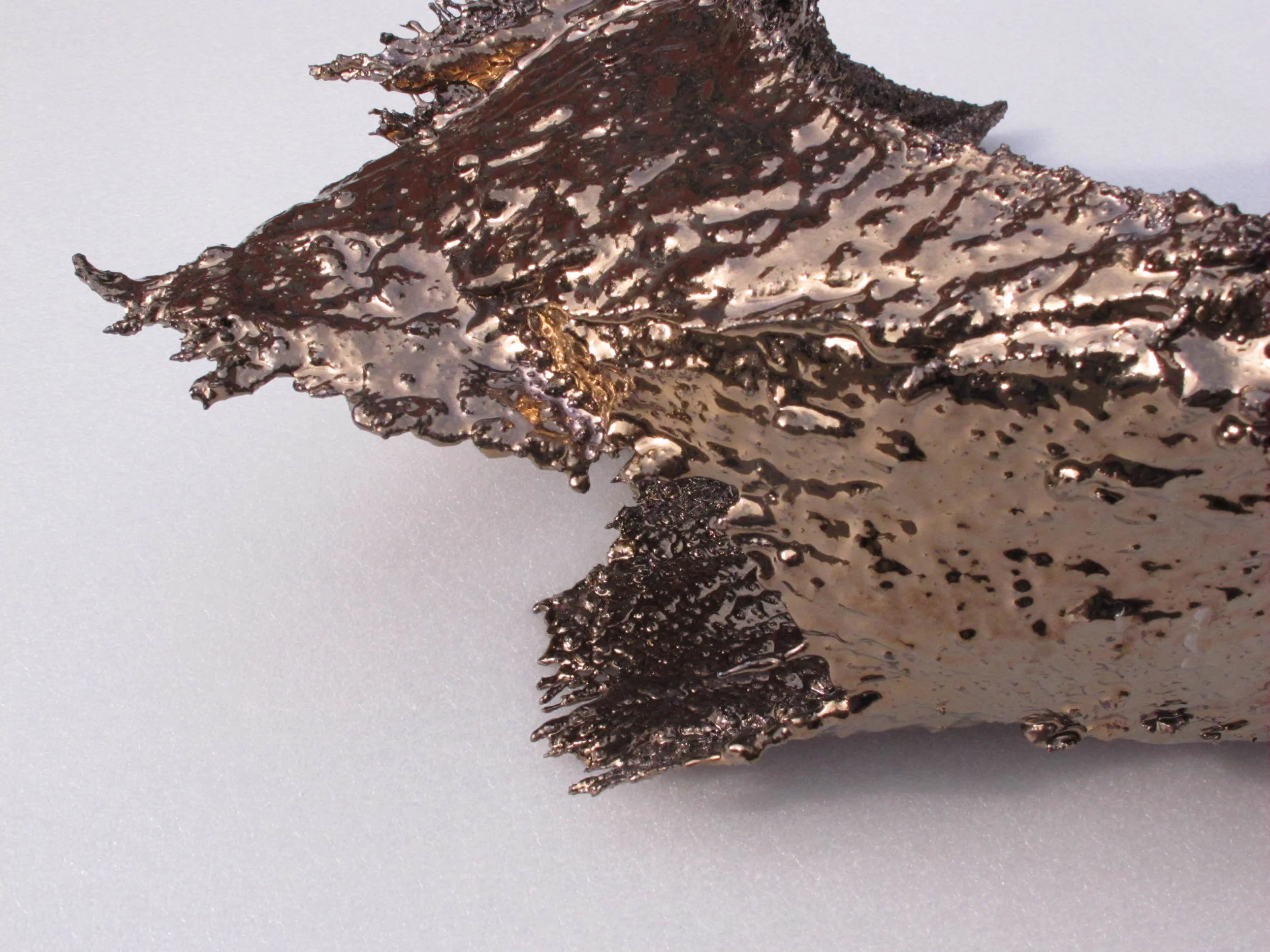 Flying Clay: Bronze, 2013, detail showing frayed edge of original hessian fabric (burned out in firing)