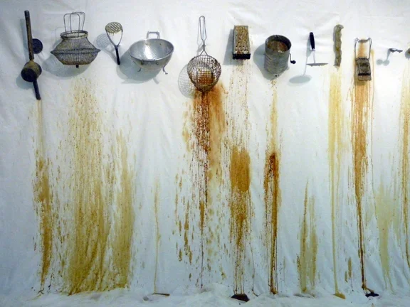 False Promises, 2009. Metal utensils, honey, beeswax, polycotton