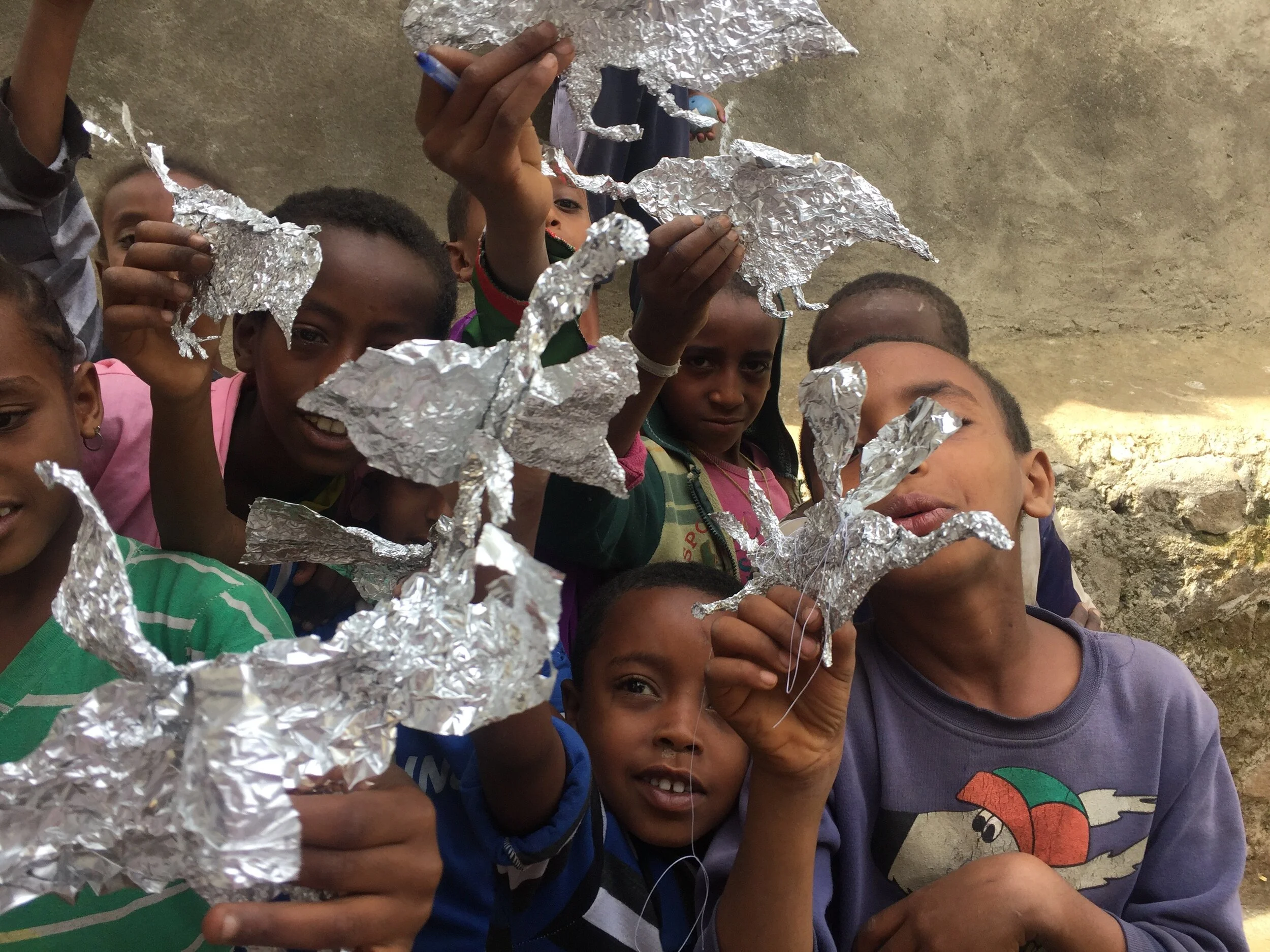 a flock of aluminum foil birds