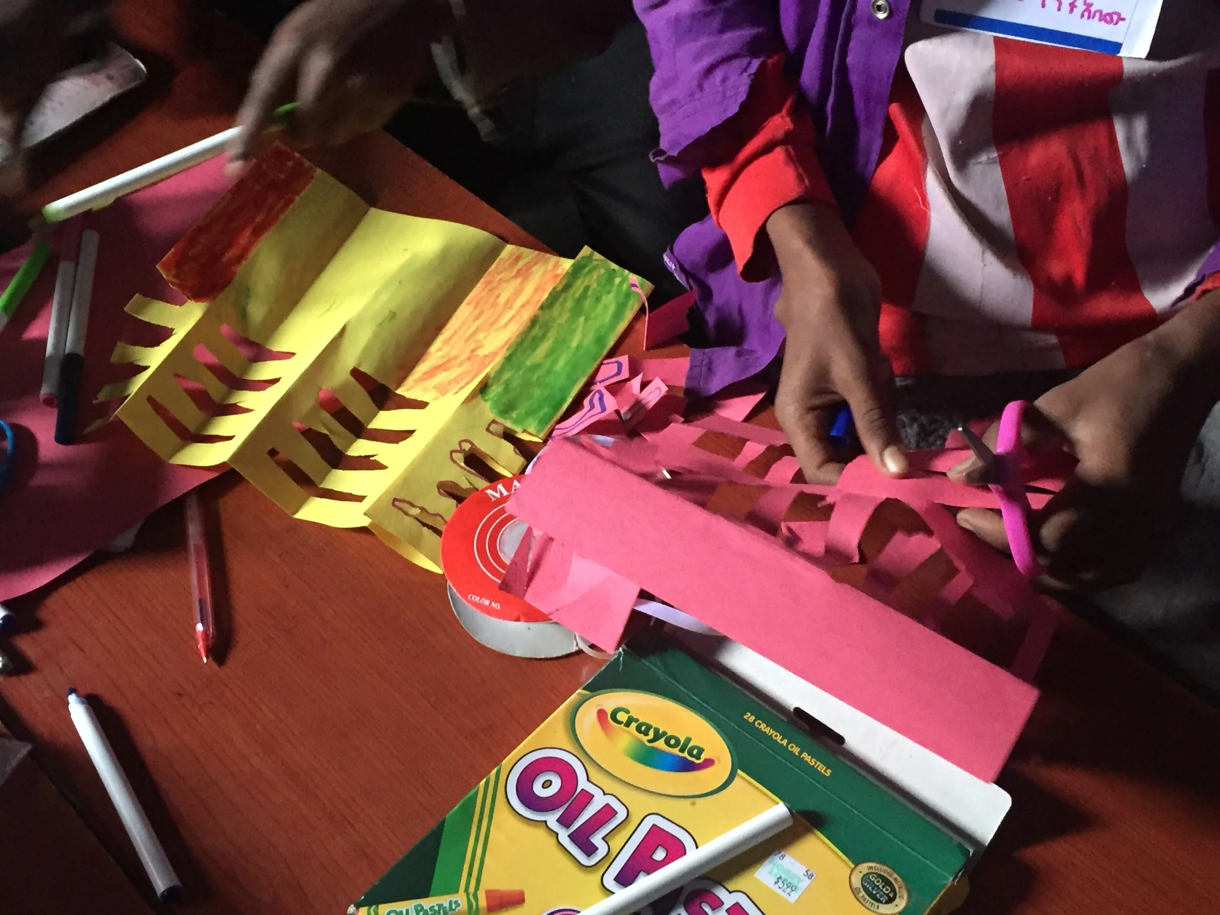 Folded-and-scissor-cut paper fans