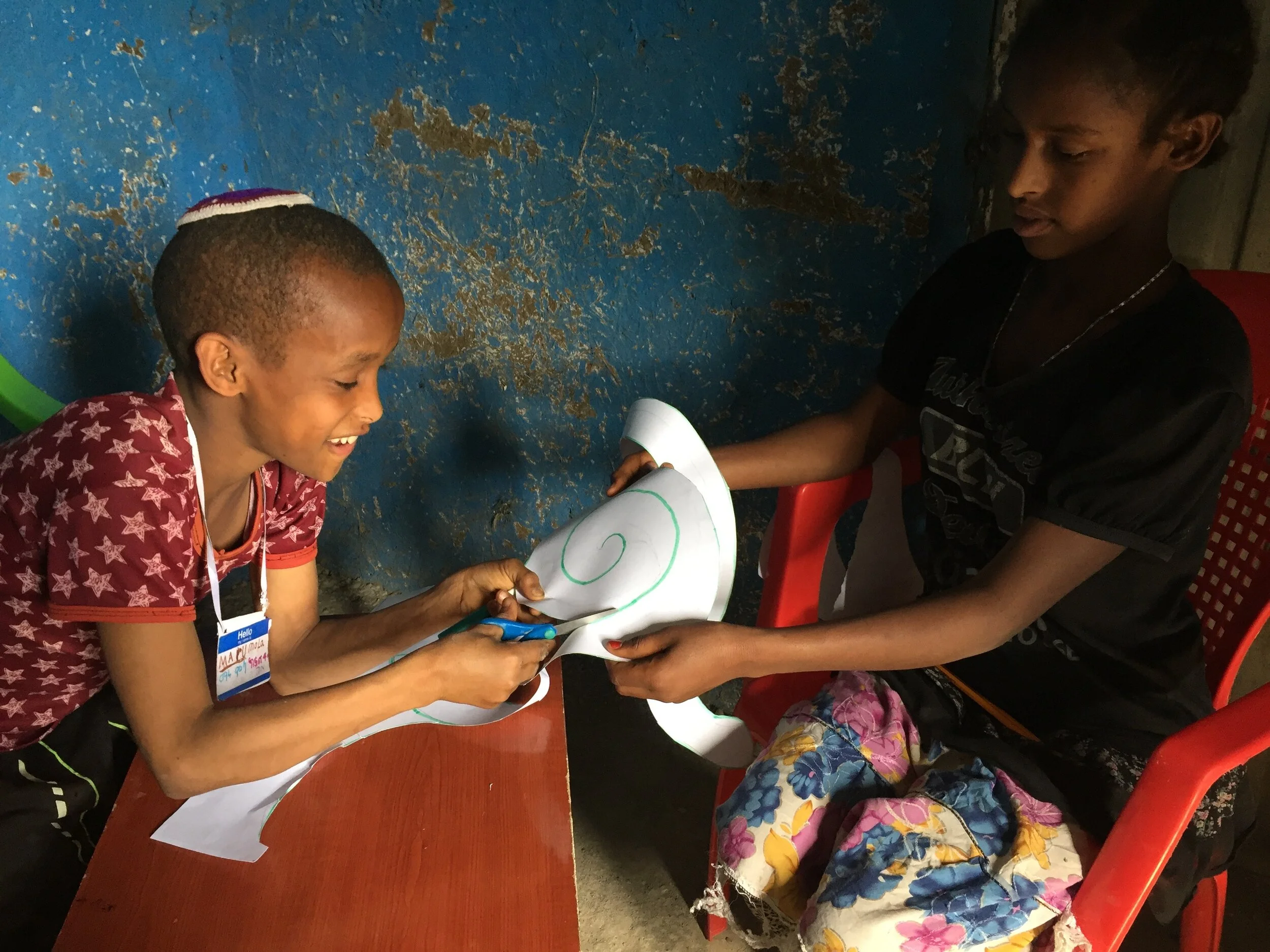 Paper snakes from simple spirals