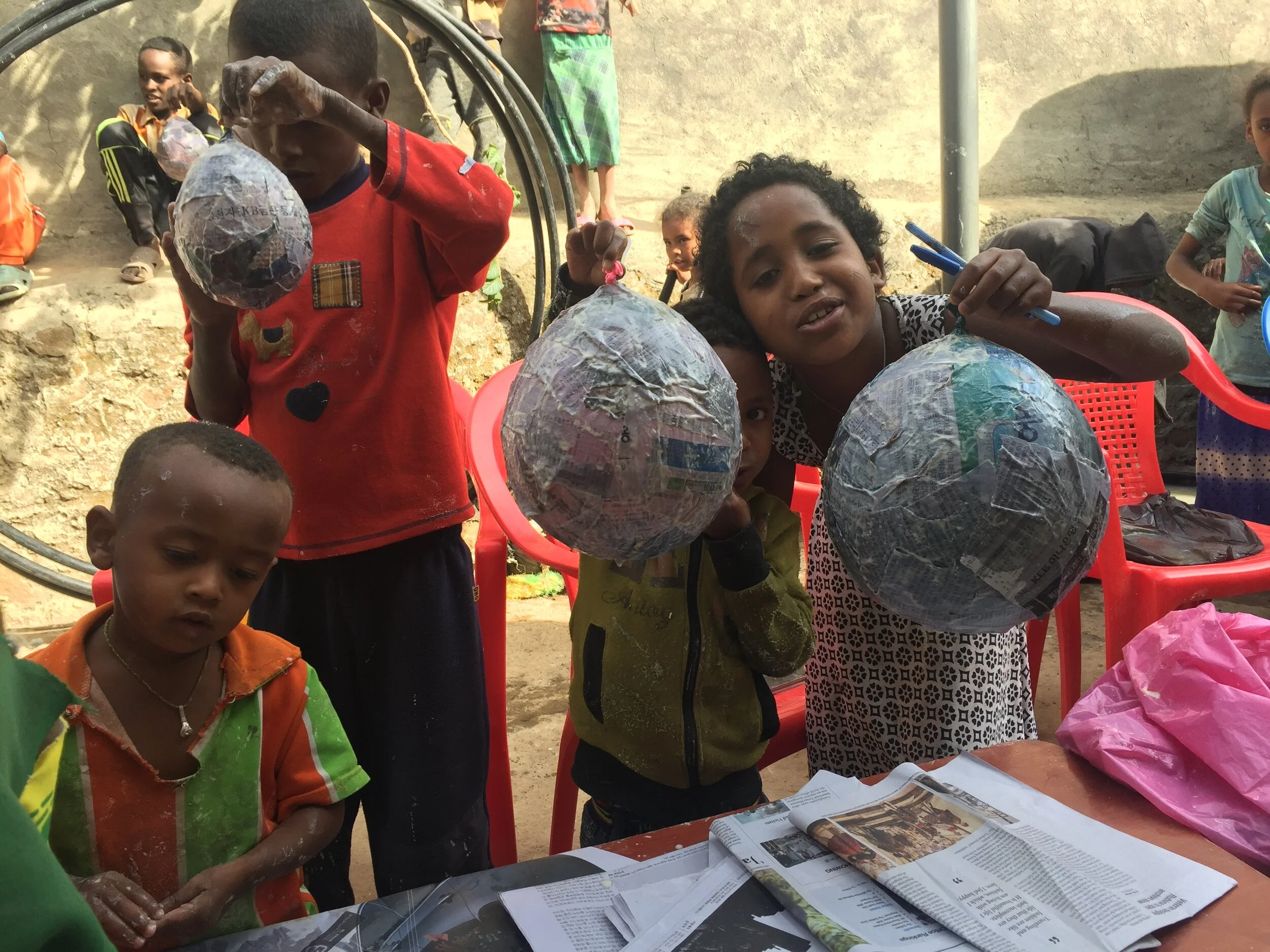 Balloons dripping from their papier maché dipping