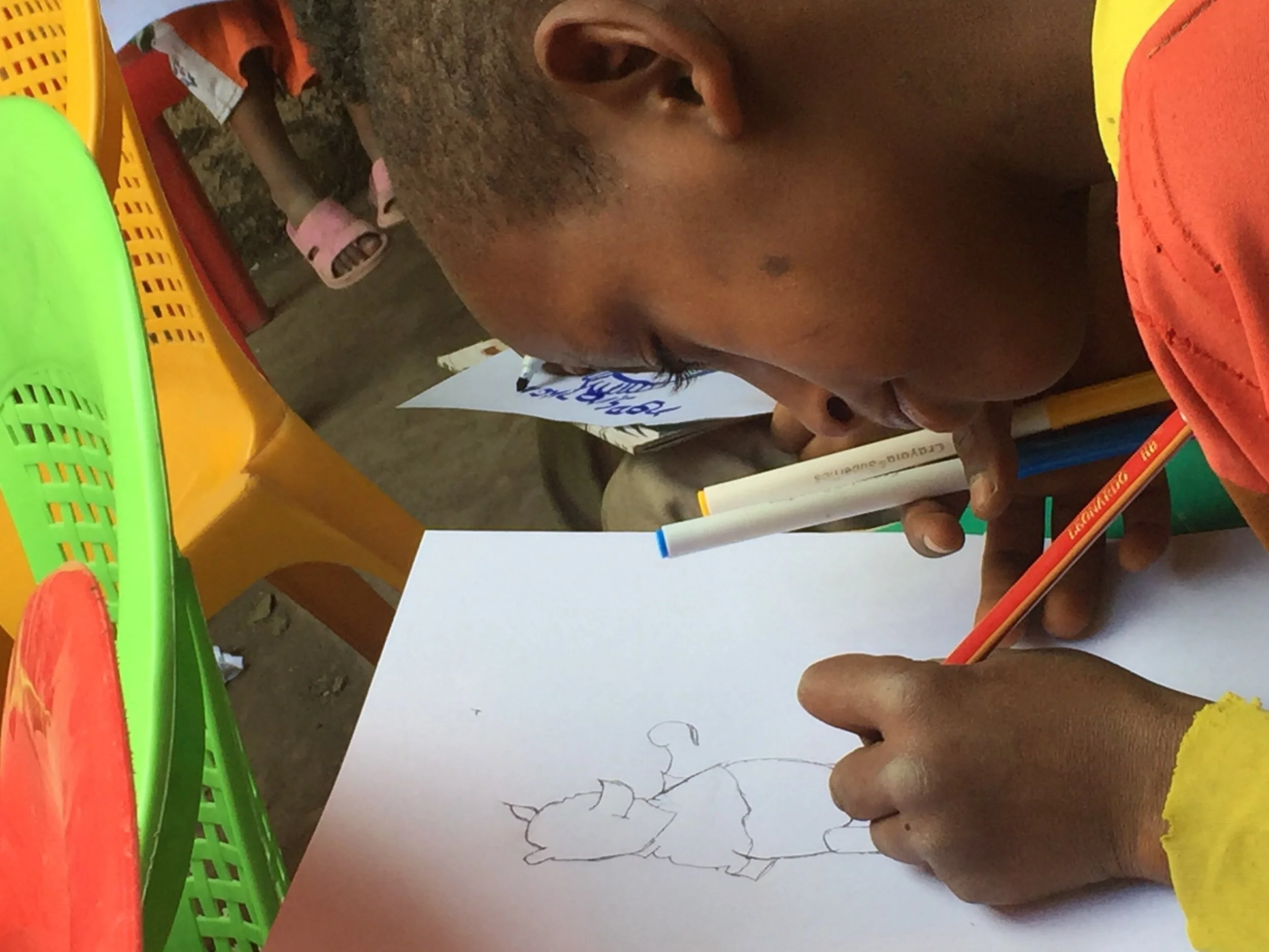 drawing Winnie the Pooh from courtyard mural