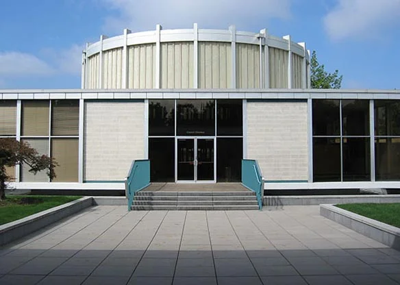 "As Eugene grew in population and as building codes changed, it became obvious that City Hall did not meet the needs of local government. The 84,000 square foot building had become too small to house the many government departments and personnel, and city planners acquired office space in various nearby locations. City Hall relied upon steam heat provided by the Eugene Water and Electric Board, and when EWEB announced that it would no longer supply steam to downtown Eugene, the building's energy inefficiencies became obvious. Most troublesome to engineers, however, was that the building would not be structurally sound in an earthquake and could collapse into the lower-level parking area. Gradually, all city offices were moved, and the building was abandoned in 2012."