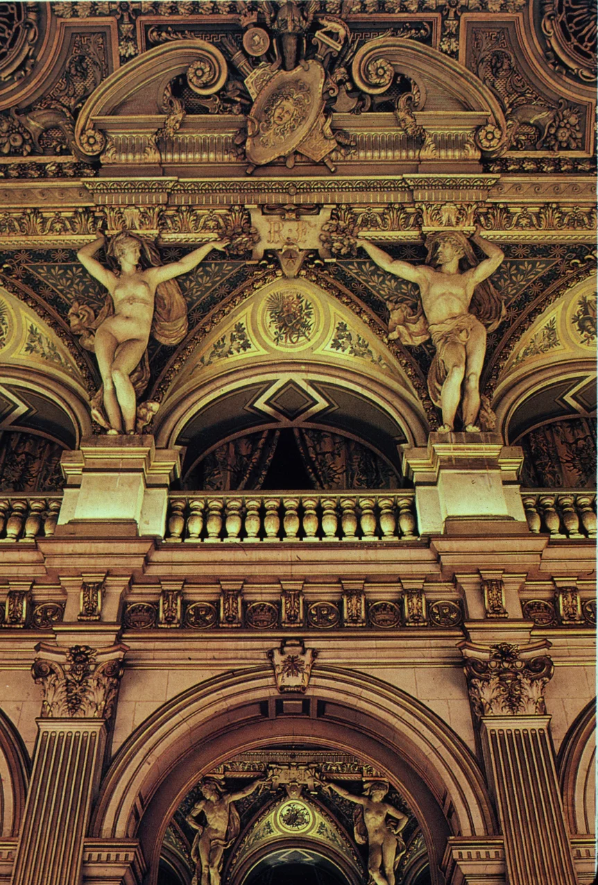 On the shields above the caryatids: the Roman heritage of Lutetia, pictured by a Medusa, a fasces , and the wolf that nourished Romulus and Remus